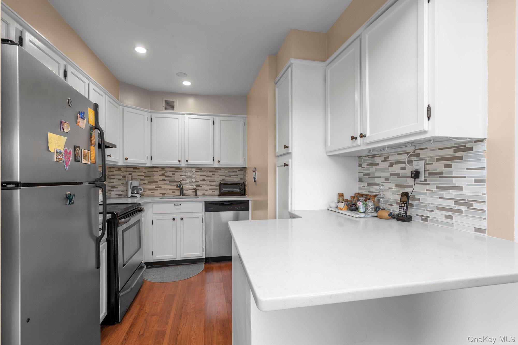 Spacious open concept layout with an abundance of natural light throughout.  Oversized windows flood the space with sunshine, creating a bright  and airy atmosphere, ideal for both everyday living and entertaining.  Thoughtfully designed with generous room sizes. Large terrace with sliding glass doors for easy access from your dining room and master bedroom. Open Updated kitchen with granite countertops.  Laminate flooring throughout.  Large bath featuring modern finishes.  Prime parking available for transfer.  Lehavre offers 3 tennis courts, 2 outdoor swimming pools, playgrounds, clubhouse with gym.