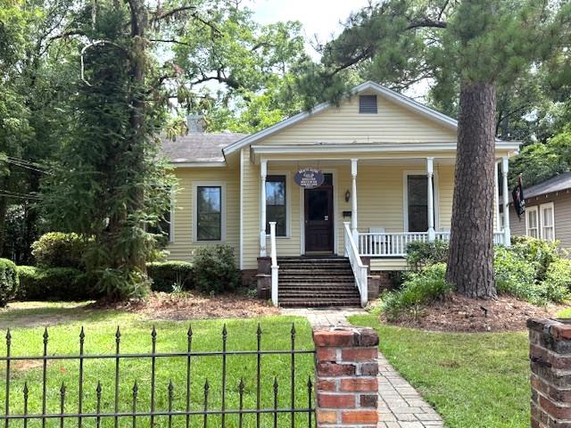 Take a look at this beautiful historic home just around the corner from the Iconic Big Oak and a few blocks away from Thomasville's beautiful downtown. Built in 1900, this captivating space meets today's standards while preserving its original allure. Key features include a big, open foyer, original hard wood flooring, elegant custom mill work and tall ceilings. There are 4 bedrooms, one with a private entrance in the rear, or 3 bedrooms and an office. This home has 1 1/2 baths, a storage room out back, plenty of parking and a nice front porch to enjoy that morning cup of coffee. The C1A zoning also allows for many different uses for this property. In addition to being a home, it could also be an office, a spa, a multi-family property, or other like uses. Seize this rare opportunity to lease a piece of Thomasville's history.