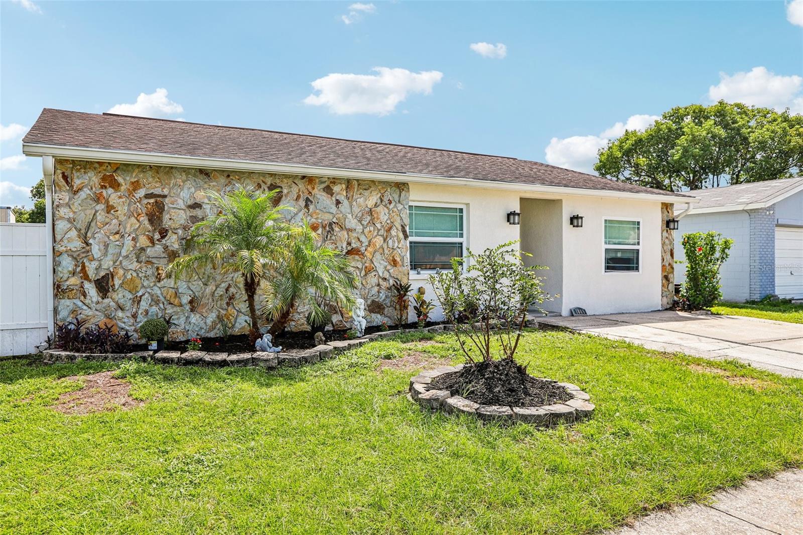 4 Bedrooms | 2 Bathrooms | Bonus/Flex Room | Private Pool | Screened Patio | New 2026 AC | 2018 Roof | NO HOA | NO CDD **Welcome to Heather Lakes, where you can enjoy the Florida lifestyle without the added expense of HOA or CDD fees! This spacious and versatile 4-bedroom, 2-bath pool home offers multiple living spaces, flexible bonus rooms, and fantastic entertainment features.  Step inside to find new flooring in all four bedrooms , along with a brand-new AC system installed in 2026, including two years of service and maintenance for added peace of mind.  One of the home's most unique features is the converted garage, currently being used as a fourth bedroom but originally designed as a dedicated media/theater room. The space is equipped with built-in surround sound and audio speakers, a USB hookup for a projector, and in-wall connections for a receiver. The living room also features built-in surround sound, making this home perfect for movie nights, watching sports, listening to music, and entertaining family and friends.  A bonus/flex room, currently used as a home office, provides even more versatility and could easily serve as a study, hobby room, playroom, fitness room, or additional living space.  Step outside and enjoy the best of Florida living in your own private backyard retreat. The in-ground swimming pool and newly screened-in patio provide the perfect setting for relaxing, entertaining, or cooling off on warm Florida days.  Additional features include a dedicated laundry room and a roof replaced in 2018.  Best of all, there is NO HOA and NO CDD, giving you greater freedom and eliminating the additional monthly fees found in many nearby communities.  With a private pool, multiple flexible living spaces, built-in entertainment features, updated flooring, a new 2026 AC system, 2018 roof, and no HOA or CDD, this Heather Lakes home offers the space, flexibility, and Florida lifestyle today's buyers are looking for. Walking distance to the elementary school