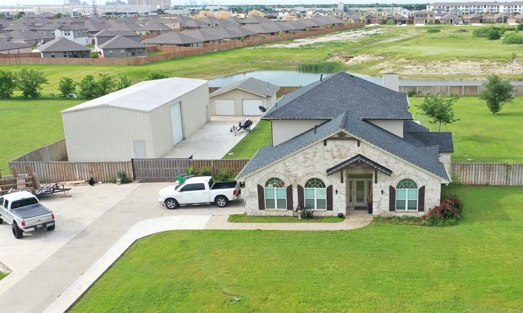 Horses Welcome! This remodeled home sits on over an acre of land, providing ample space to park your boat or RV. It includes a second detached two-car garage and a large shop or storage building. The property features new HVAC unit, a new well pump system, and a new sprinkler system. Inside, you'll find extensive wood-look ceramic flooring and all natural stone countertops. There is plenty of room for entertainment in the backyard, which includes a pool and a large patio. No HOA, No City Taxes, and with a private well = No water bill. Build your outdoor oasis, the possibilities are endless.
The home offers four bedrooms, a study, and an upstairs game room. It is located in the Eagle Mountain-Saginaw Independent School District in Tarrant County and is unincorporated, meaning there are no city taxes! The property is serviced by a septic system, well water, and owned propane.