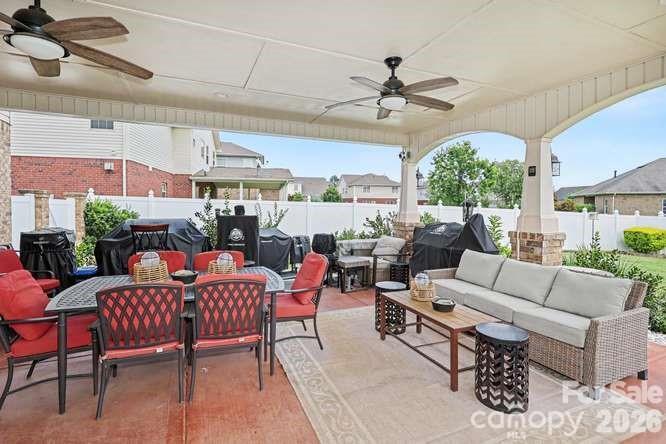 Welcome to this beautifully maintained 3-bedroom, 2.5-bath home, where comfort, style, and inviting spaces come together! Attractive curb appeal, manicured landscaping, and a charming covered front porch create a warm first impression.Step inside to discover a thoughtfully designed interior featuring beautiful wood-look laminate flooring throughout the main living areas, an inviting family room with a fireplace, and an open kitchen and dining area ideal for everyday living and entertaining. The spacious kitchen features rich wood cabinetry, granite countertops, stainless steel appliances, recessed lighting, and an expansive breakfast bar offering additional seating and gathering space.Upstairs, the generously sized primary suite offers a private en suite bath and a large walk-in closet. Two additional bedrooms, a spacious secondary bathroom, and a versatile loft provide plenty of room to spread out. Whether envisioned as a reading retreat, home office, or cozy relaxation space, the loft offers flexibility to suit your lifestyle.Outdoor living is a standout feature! Enjoy an expansive covered patio with ceiling fans and generous space for outdoor dining, lounging, and entertaining. Beautiful landscaping and attractive fencing enhance the outdoor setting, creating an inviting space to relax or gather with friends and family.Additional highlights include a two-car garage and access to the neighborhood swimming pool.From its welcoming interior to its exceptional covered outdoor living area, this home offers a wonderful balance of everyday comfort and entertaining possibilities.**Come discover all that 14706 Vaughn Drive has to offer!** Full Professional Photos are forthcoming.