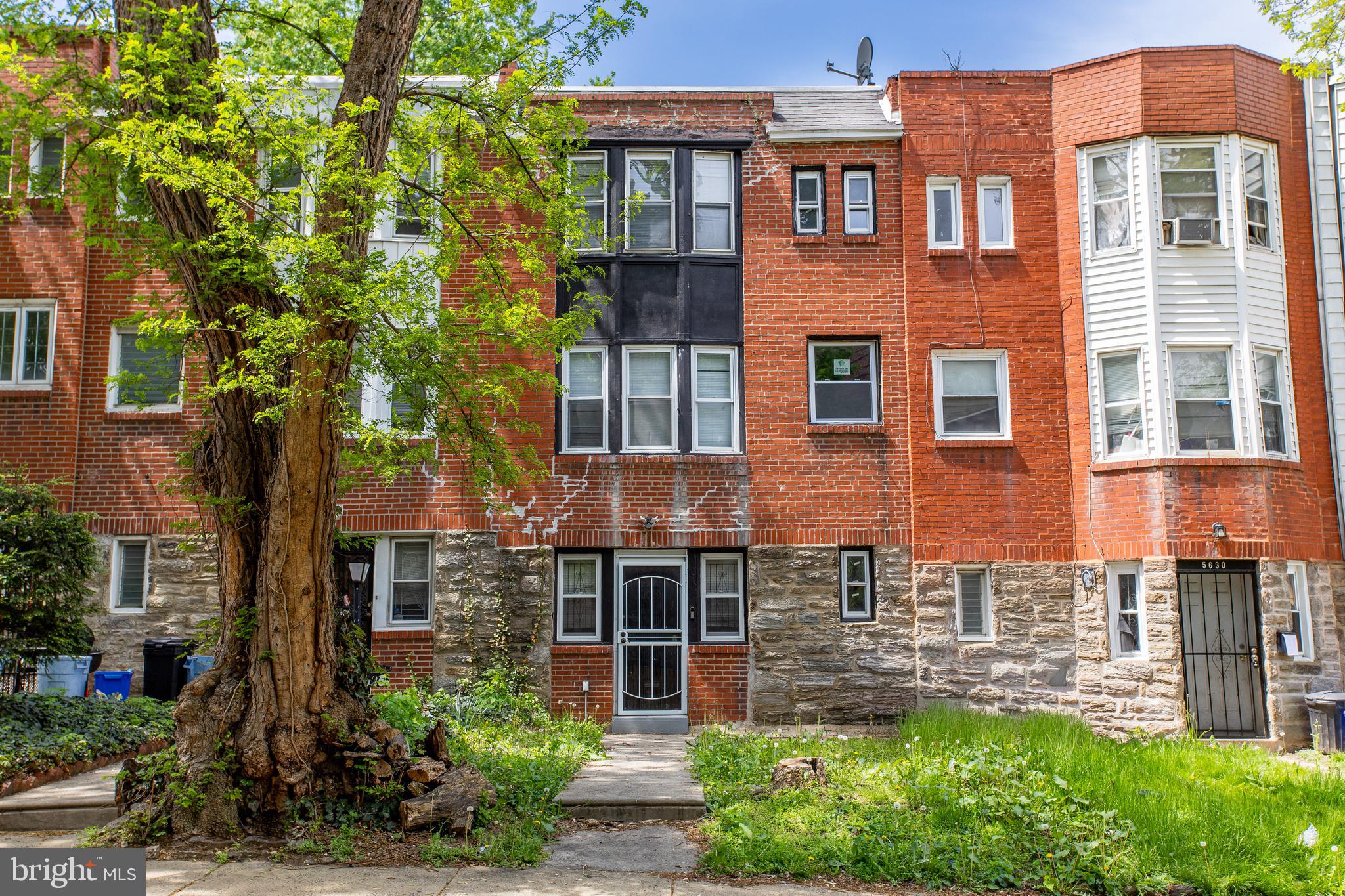 Location, Location, Location. This is a four bedroom and two and a half bathroom house in the heart of the LaSalle University campus. Located just in the LaSalle's student housing area a minute away from the major city's artery: Broad St. The house is in the middle of the row, boasting four big bedrooms with three of them located on the top floor. One of the bedrooms is a master suite with a standing shower, the other three are served with a full bathroom equipped with a bathtub. All the bedrooms have recently installed carpeted flooring. Nice and clean.  The second floor has enough space for the living/dining space on the one side and a big kitchen with the peninsula on the other side of the area. Clean kitchen with gas stove, refrigerator, bar stools across the peninsula. The quality laminate flooring is installed throughout the house. The utility room is set on the first floor and another big bedroom with access through the utility room. The utility room has laundry appliances, this is a perfect convenience for the future tenants/owners of the house.