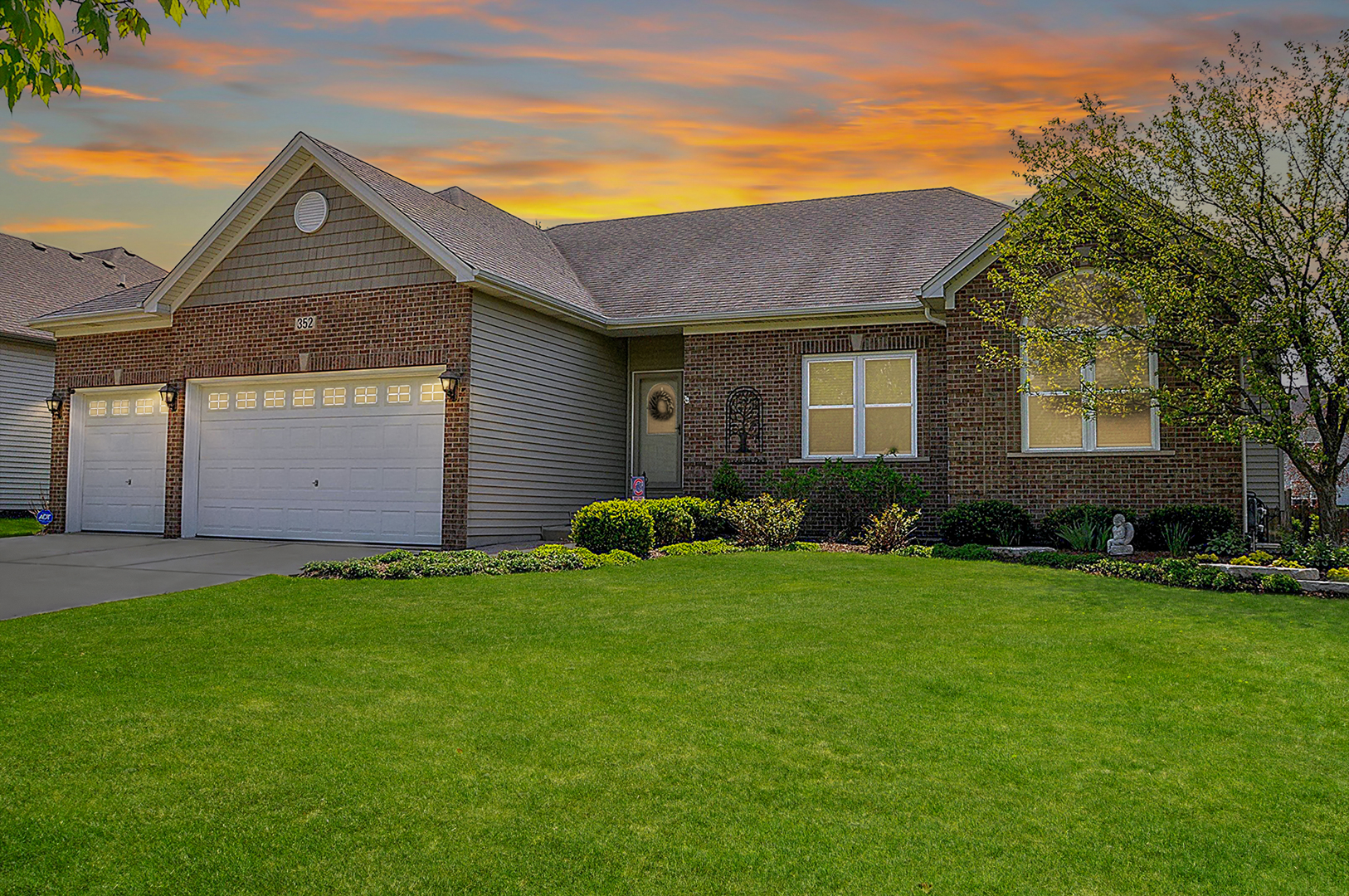 Better than new! This exceptional, move-in-ready 4-bedroom, 3.1-bath luxury ranch in prestigious Deerpath Trails pairs effortless single-level living with over 3,200 square feet of impeccably finished space including the full, finished basement. Perfectly tailored for the discerning buyer, it delivers sophisticated, low-maintenance luxury, rich architectural details and thoughtful recent updates. Step inside the gracious foyer with gleaming real hardwood floors offering long-term longevity and easy maintenance throughout the main floor common rooms. The expansive family room features a soaring volume ceiling that enhances the sense of space while a classic brick fireplace serves as the dramatic anchor to this comfortable central living area. The chef's dream kitchen is outfitted with custom staggered cabinetry, a custom tile backsplash, an oversized island, an impressive suite of newer stainless appliances and elevated with premium Taj Mahal quartzite countertops. Enjoy morning coffee in the sunny breakfast room while the dedicated formal dining room offers an elegant backdrop for intimate dinners and holiday gatherings. At days end, pamper yourself in the serene primary retreat with a refreshed ensuite bath, luxurious jetted-tub, walk-in shower, private water closet, double vanity and walk-in closet. Two more bedrooms, a family bath and 1/2 bath are on the main level. The fully finished basement offers private guest quarters with the 4th bedroom, adjoining 3rd full bath and an expansive recreation arena, while a custom brick patio with sitting wall and a manicured backyard oasis serviced by a 6-zone sprinkler system completes this low-maintenance masterpiece. The main floor laundry room is conveniently located between the 3-car garage and kitchen with storage cabinets over the washer/dryer area, utility sink and additional walk-in closet for all your large COSTCO purchases. Priced below reproduction cost with extensive recent upgrades, this home delivers turnkey comfortable living at its finest. Many updates within last 5 years: Windows (2025) with 10 year transferrable warranty, water heater (2026) with 6 year transferrable warranty, furnace humidifier (2025), lighting, all kitchen stainless appliances, whole house filter system (2021), landscaping, brick paved patio (2021) and quartzite countertops in kitchen, primary bath, family bath and 1/2 bath plus more. Located near Andover Park with convenient access to miles of walking/biking trails connecting to Oswegoland's Prairie Park.