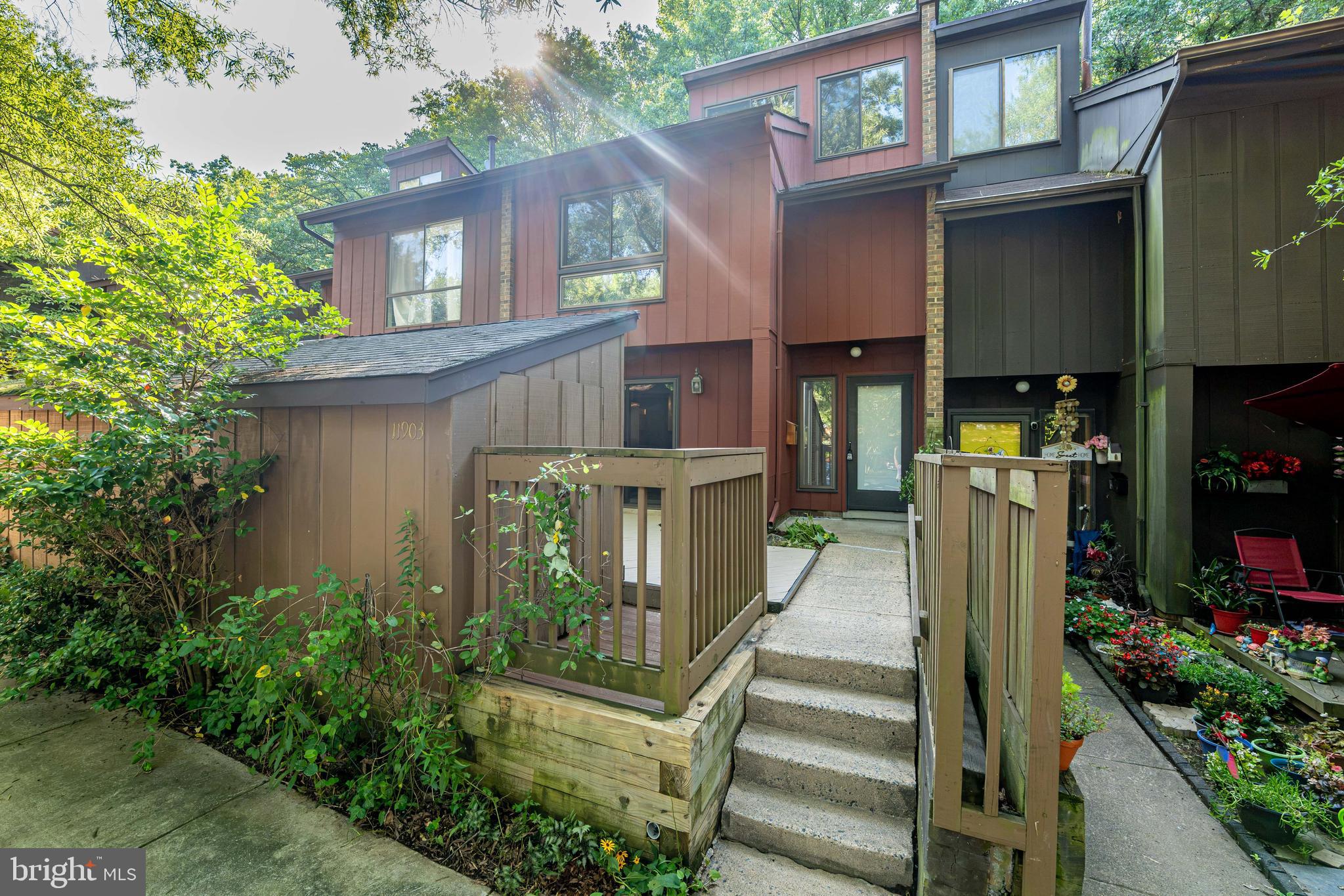 Updated 3 Level townhome tucked into a quiet, tree-lined setting in the heart of the community. With two inviting outdoor spaces, including a private deck backing to trees and huge storage shed, this home offers the perfect balance of indoor comfort and outdoor living. Inside, you’ll find over 1,700 square feet with three bedrooms, two full baths, and a half bath, plus a spacious upper-level loft ideal for a home office, rec room, or flex space. Kitchen with stainless steel appliances, custom hand made solid wood cabinets, granite counter tops with full back splash. The home blends classic Reston charm with thoughtful modern updates throughout.  The bathrooms have been tastefully updated, new Luxury Vinyle Plank Flooring on all three levels and the interior/exterior has been freshly painted—making this home truly move-in ready. The setting is just as special as the home itself. Tucked toward the back of the community and surrounded by greenery, it offers a sense of privacy while still being close to everything. A nearby walking trail makes it easy to get outside and enjoy the natural surroundings. Living in Reston means access to an incredible range of amenities, including pools, shopping, community centers, basketball and tennis courts, arts and events, a farmers market, and a wide variety of restaurants. Additional features include a private, fenced front entrance and ample open parking for guests.