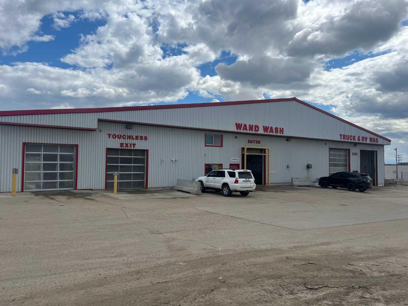 Lac La Biche's most well-established, well-known, CAR WASH is for sale!   This car wash is located downtown, on the main highway, next door to the famous Squirrley's Gas Bar & Convenience Store and performs well, producing solid, reliable REVENUE.  The car wash includes a barn with 8 self-serve, wand wash bays.  There are also 4 separate bays that house 2 RV/Truck Wash bays + 1 automatic/touchless wash bay (by Ryko) + 1 soft cloth wash bay (by Wash World) all contained in a 16,000+ sq ft building, on one acre of land.  There are also 4 outdoor vacuums.  This is a well-loved, well-maintained car wash, built in 2004 and continues to be operated by the original owner.  A new hot water on demand system was recently installed.  The car wash features all LED lighting, is fully staffed, and is still a coin operated car wash! Exceptional opportunity for a new owner to install "tap" and other payment options, and continue to grow this busy car wash.  Please do not speak with staff or customers regarding the sale of this business.  Appointment is required to view.