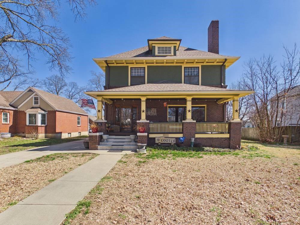 Discover this charming two-story brick and stucco home that features a spacious, front-covered porch perfect for enjoying the outdoors. Inside, you'll find beautifully detailed hardwood floors and stylish trim, complemented by a striking beveled glass front door and accent windows that add character. The home boasts three inviting bedrooms, including a full bath and two half baths for convenience. The finished partial basement offers additional living space, equipped with multiple zoned mini splits for optimal climate control. With ample storage throughout, a full walk-up attic, and a detached garage featuring a storage area, this property is designed for functionality and comfort. Plus, a delightful detached backyard clubhouse makes it an ideal retreat for relaxation or play.