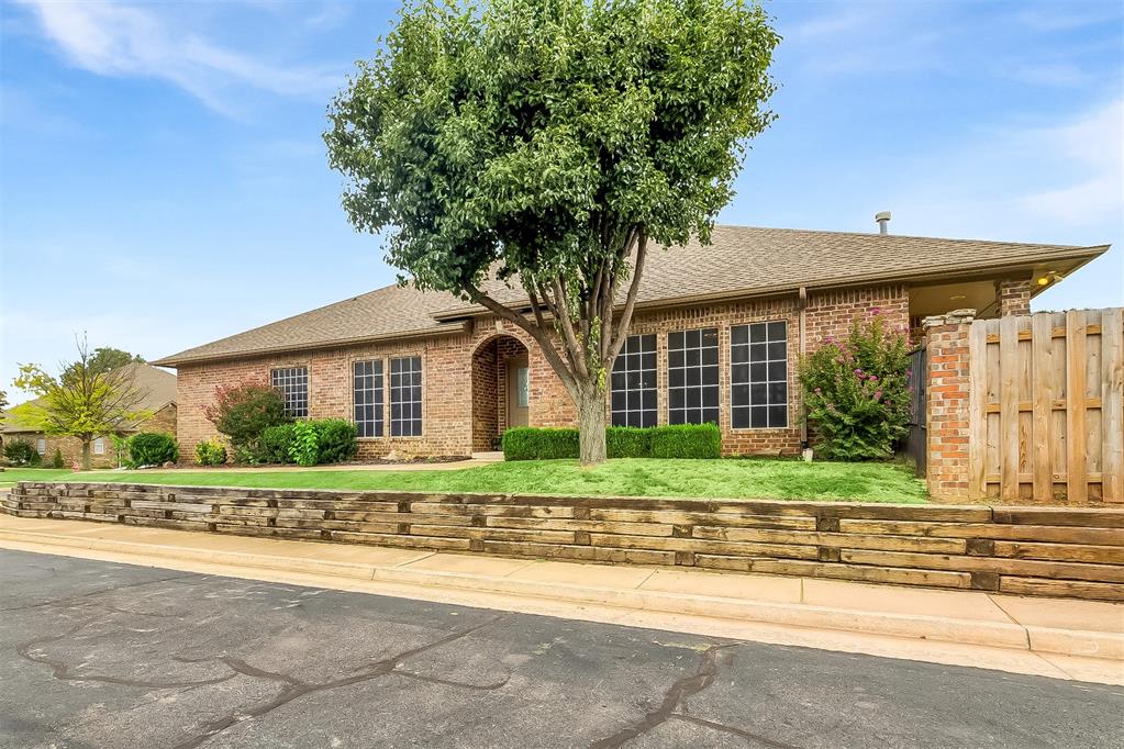 Located in the quiet community of Laurel Court, an intimate 26-home enclave, this two-bedroom, two-bath half-duplex offers low-maintenance living just minutes from downtown Edmond. Inside, a generous living room with a gas fireplace anchors the home, while the kitchen is complete with a breakfast nook and a dedicated laundry space nearby. The backyard includes a charming little porch to enjoy without the hassle of upkeep. The HOA takes care of lawn care, exterior painting, sprinkler maintenance, fertilizing, and even seasonal leaf pickup, leaving you free to simply enjoy your home. A rare opportunity to enjoy comfort, convenience, and community all in one easy-to-maintain home.