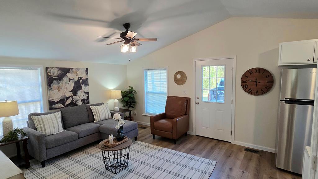 Cute, cozy and updated mobile home that sits on over an acre of land. This 3 bedroom1 bath home is located in the county and less than 2 miles from the county schools and Walmart. This would be perfect for someone who wants to downsize or someone just starting out. Need extra storage space outside, this home comes with an huge 24'x36' storage building perfect for finishing it out to be an office or workshop . Current updates include new paint, LVP flooring, new stainless appliances, and new HVAC system.Existing metal roof for years of maintenance free troubles. This home is move in-ready, with plenty of room outside for the fur babies. Owner financing or lease purchase is available with downpayment. Don't wait, this one won't last long. Call your favorite agent today. Seller isGA R.E. Lic# 314462