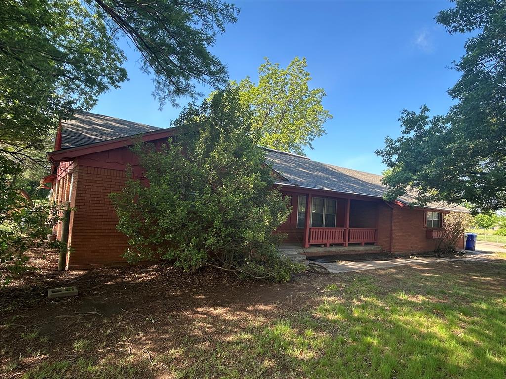 Nestled in a highly desirable area, this one-of-a-kind property offers the rare opportunity to enjoy 2.5 private acres right in the heart of town. This spacious single-family home features 3 bedrooms and 3 unique bathrooms with an inviting layout designed for both comfort and entertaining.The bright Florida room is surrounded by windows, creating the perfect space to enjoy morning coffee while taking in peaceful outdoor views and abundant natural light. The home also features a large kitchen, an oversized dining area with a cozy fireplace, and a second formal dining room that is ideal for gatherings and special occasions.The oversized primary suite provides plenty of space to relax and unwind. Outside, you’ll enjoy the covered front porch and beautiful backyard views across the 2.5-acre property, where wildlife is often seen roaming. The property also includes a 2-car garage, a large storm shelter with convenient access from the garage, ample storage throughout, and a detached 20x30 workshop perfect for all your needs.This unique property combines space, privacy, and convenience in an exceptional location, offering the feel of country living while remaining close to town amenities.