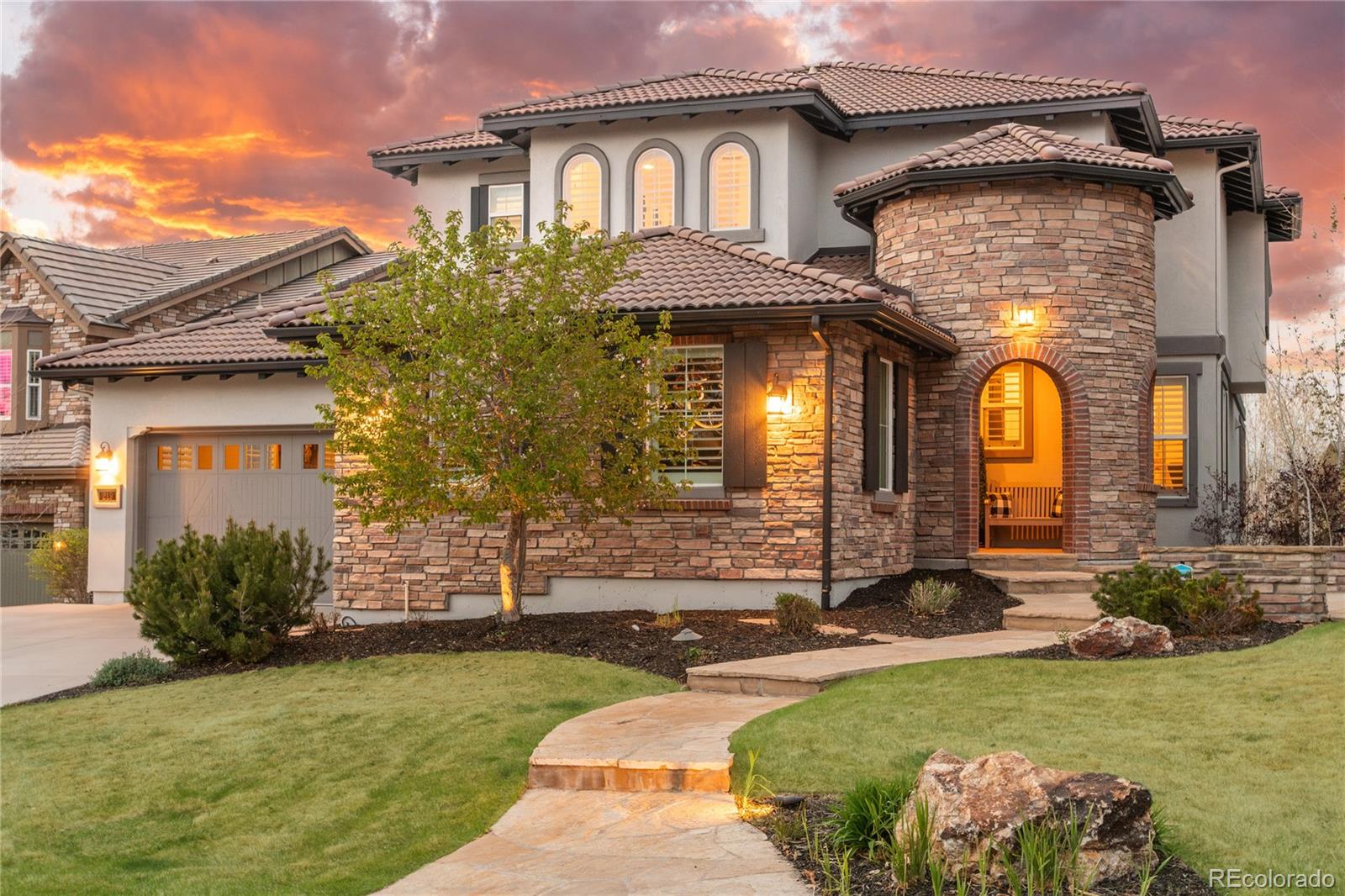 Situated on a quiet cul-de-sac, with expansive .25 acre lot, and backing to open space, this highly sought-after SERENITY STAR model offers the perfect blend of privacy, luxury, and modern design. Thoughtfully re-designed by a well-known designer, this home showcases stunning, high-end updates throughout and is truly move-in ready. The brand-new designer kitchen is the centerpiece of the home, featuring custom cabinetry, elegant quartz waterfall-edge countertops, and top-of-the-line appliances—perfectly designed for both everyday living and elevated entertaining. Recent enhancements include new stair railings, fresh interior & exterior paint, plush new carpet, custom built-ins, and sophisticated designer lighting that creates a warm yet refined ambiance. Seamless indoor-outdoor living is achieved through pocket doors that open effortlessly to a beautifully designed outdoor retreat. Enjoy year-round entertaining with a fully equipped outdoor kitchen, cozy fireplace, built-in heaters, and generous space for both lounging and dining—all set against the peaceful backdrop of open space. The main level guest suite is as functional as it is stylish, complete with a custom built-in desk and Murphy bed, offering flexibility for guests or a private home office. The beautiful upper level has a primary suite w fireplace, mountain views and custom finished his and her closets, two bedrooms with en-suite bath plus a large bonus room which is perfect for homework/ play room or extra bedroom.The walk-out lower level is equally impressive, featuring a custom bar, built-ins, and a striking fireplace—ideal for hosting or relaxing, plus rec area, home gym and guest suite.  Meticulously maintained and finished to perfection, this home is the definition of turnkey luxury. Love the lifestyle of Beautiful Backcountry- with resort style pools, parks, ponds, trails, coffee shop, and of course, the award winning Sundial House, with happy hour, live music and events for all. Welcome Home!