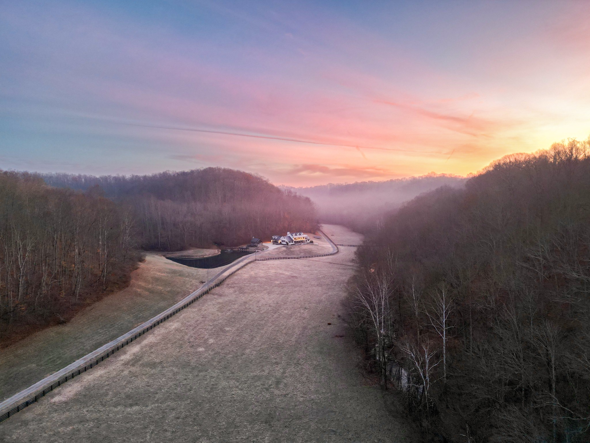 A Private Resort-Style Estate in Leipers Creek Valley — 448 Acres Curated for Luxury Living & EntertainingNestled in the coveted Leipers Creek Valley, this nearly 450-acre estate is more than a property—it’s a private resort designed for unforgettable experiences. Just minutes from Leipers Fork and Davis General, it offers complete seclusion with every amenity tailored for high-end entertaining and family legacy living.The estate unfolds as a curated destination: a newly built party barn, hidden deep in the holler, sets the stage for gatherings of 50+ guests in absolute privacy. A sleek pond-house with outdoor grilling creates an intimate backdrop for evenings of dining, wine, and conversation beside the water. For elevated sporting pursuits, a five-stand shooting field with an architecturally striking clubhouse—blending cypress wood and Tennessee limestone—delivers a world-class venue, while a stocked fishing pond, endless horseback and ATV trails, and professionally managed hunting grounds transform recreation into lifestyle.Anchoring the property, the 6,000 sq. ft. main residence is a Kathryn Zelenik Designs renovated masterpiece, offering 5 bedrooms, 5.5 baths, wide-plank white oak floors, custom cabinetry, and a light-filled master suite with sweeping views. With sleeping accommodations for up to 20, it effortlessly blends scale, sophistication, and comfort, creating the ideal setting for hosting guests or retreating with family.From high ridges to clearwater creeks, this estate is a sanctuary of nature, privacy, and luxury—an extraordinary legacy compound where every detail has been crafted for those who demand the very best.