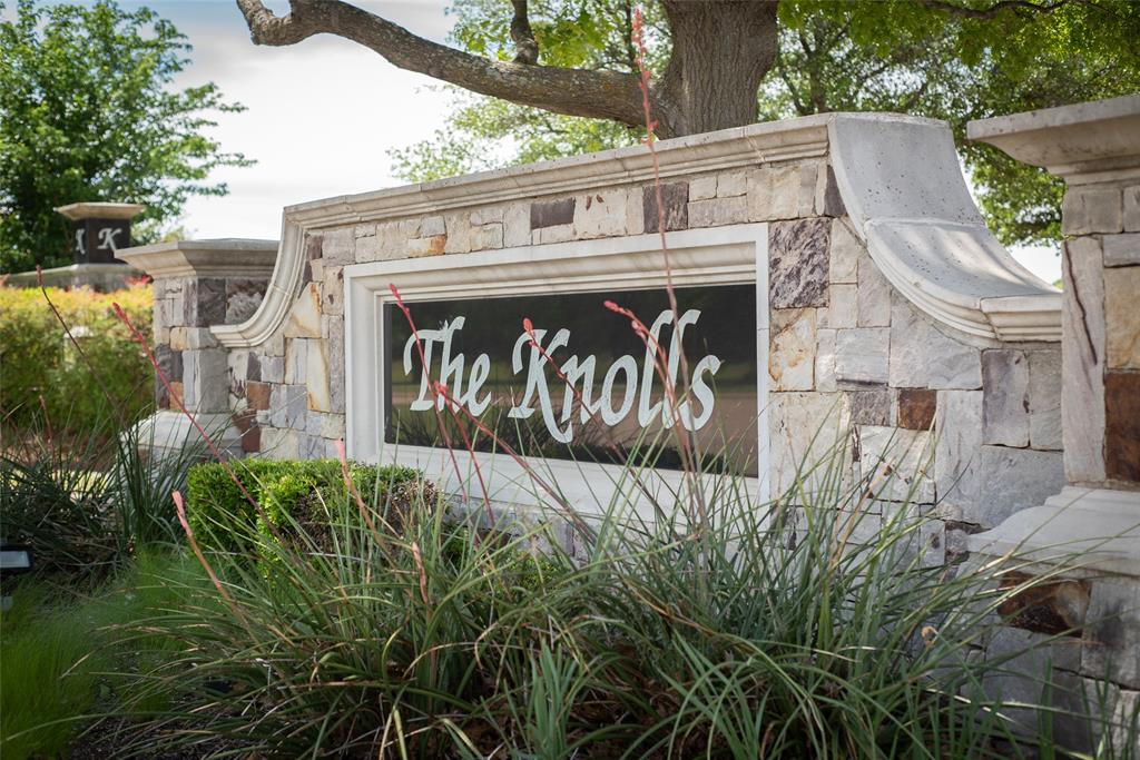 A unique and rare opportunity to build your dream home in the Knolls of Springhilll....an established, luxury neighborhood with beautiful custom homes! Sitting on the corner of a quiet culdesac, this 1 acre lot is cleared and ready to go.  Bring your builder and your vision and make your dream a reality!