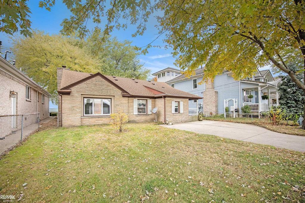 Discover an incredible opportunity to own a rare waterfront property on beautiful Anchor Bay, offering some of the most breathtaking sunset views you'll ever experience. This unique home features direct lake frontage as well as canal frontage, complete with a garage, covered boat well and a hoist-Ideal for boaters looking for convivence and access to the open water. Inside you'll find a spacious floorplan with great potential. While the home could benefit from some updating, it offers a strong layout featuring 3 bedrooms and 1.5 bathrooms-the perfect canvas to design your dream waterfront retreat.