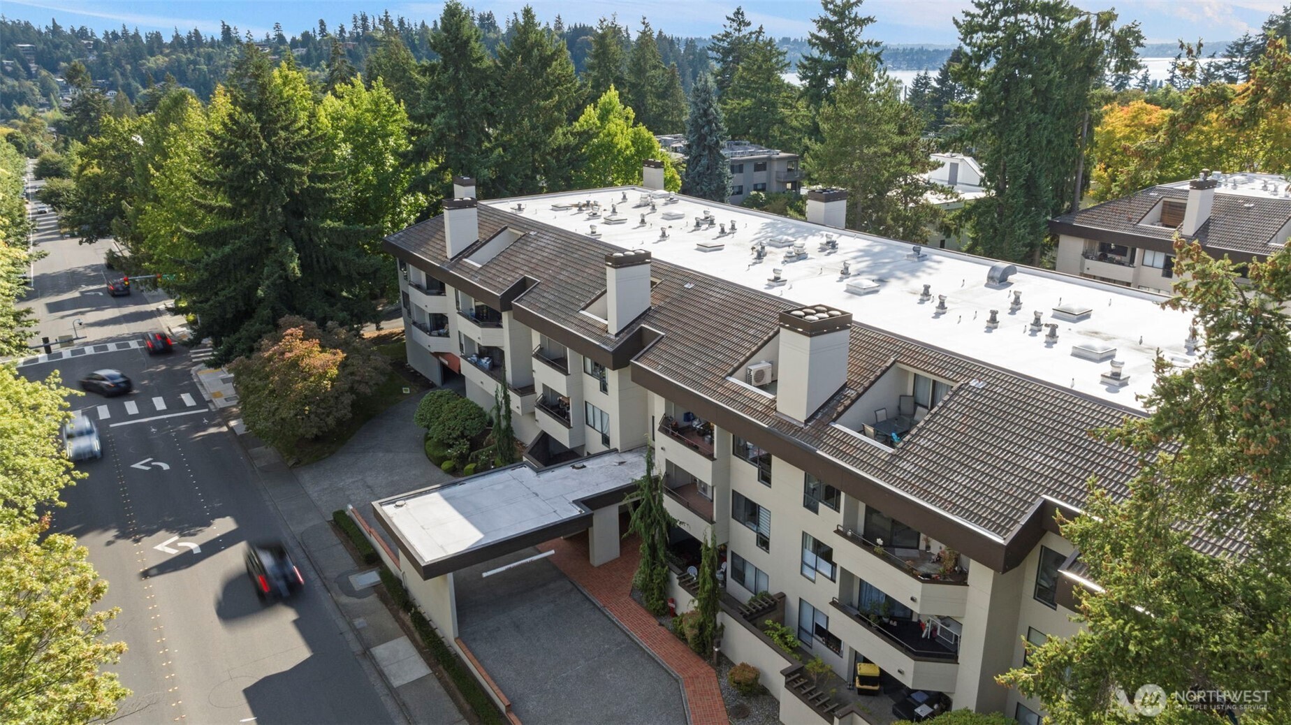 Live at Windsor House, directly across from Bellevue Square and Bellevue Downtown Park, in the heart of one of the region's most sought after addresses for under $500K with low HOA dues. This one bedroom, one and a half bath home is move-in ready, with newer appliances, updated bathrooms, and a brand new water heater already in place. A dedicated storage unit and additional deck storage add real space beyond the unit itself. Your assigned parking spot sits in a secure garage, with a separate guest garage offering EV charging and guest parking.Windsor House delivers true resort style living: a pool, sauna, and hot tub for unwinding, a fitness center for staying active, and an easy social calendar built around weekly happy hours and summer BBQs for residents who want to be part of a community. Secure building entry rounds out the everyday comforts.Beyond Bellevue Square and Downtown Park at your doorstep, Old Bellevue's restaurants and boutiques and Meydenbauer Beach Park are minutes away, and the home falls within the highly sought after Bellevue School District. Whether you're settling in full-time or looking for a low-maintenance second home you can lock and leave without a second thought, Windsor House fits, all steps from the best of downtown Bellevue!