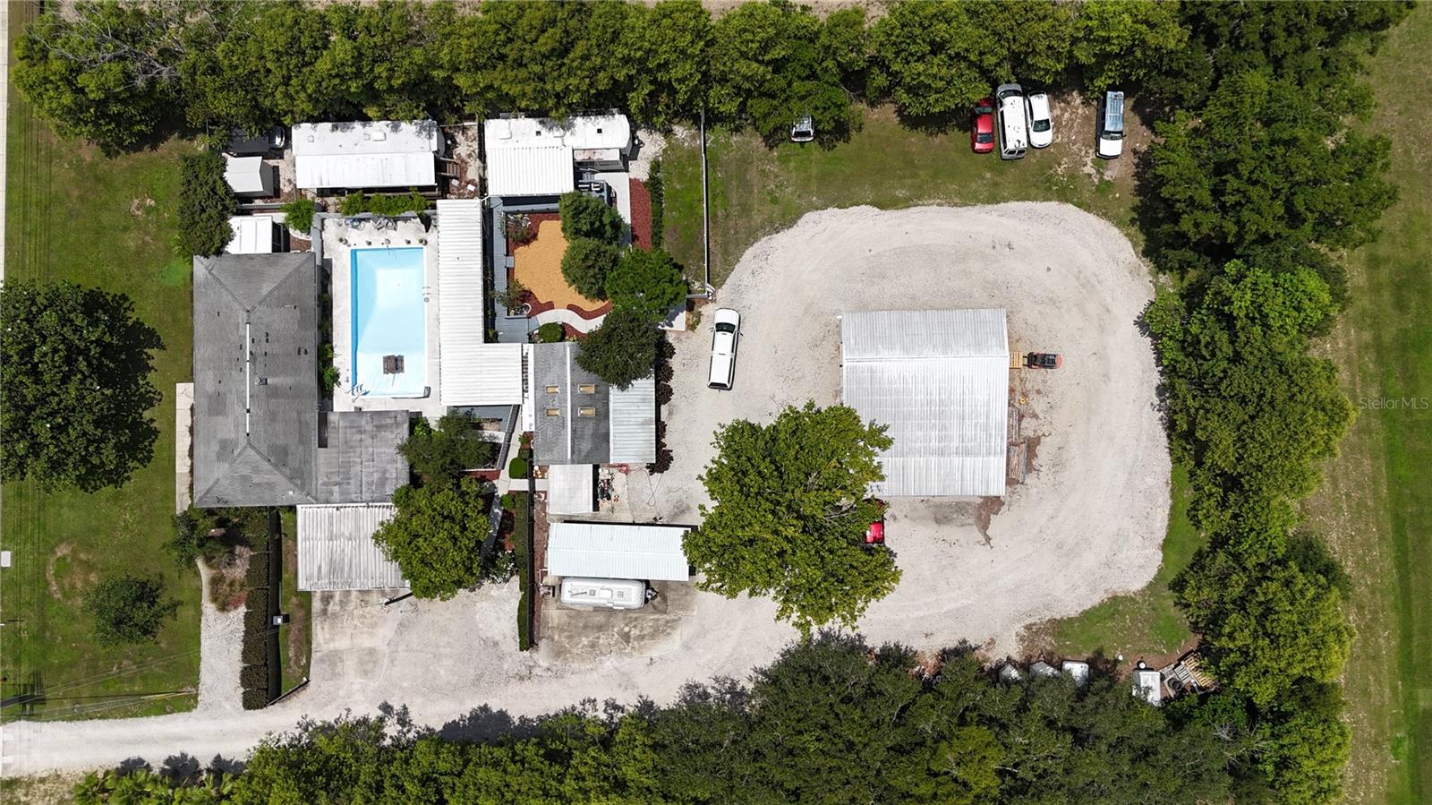 Rare 1.36-acre mixed-use development opportunity on Clubhouse RoadLocated at the high-visibility intersection with US-98 south, this versatile property features a solid 1,736?sq?ft, 3-bed/2-bath masonry home built in 1969, plus a detached shop with large shop that includes full electrical, insulated ceiling, all on a 6 inch concrete slab. The lot is currently zoned RL3X residential, but offers immediate potential to be rezoned OCX (Office Center) or even TCX (Town Center Mixed-Use) to accommodate a range of light commercial uses—ideal for an office, medical, restaurant, retail concept or combination.Positioned across from a Publix-anchored shopping plaza, adjacent to multifamily and professional office uses, and just south of the Polk Parkway/SR?60 corridor, the parcel offers premier access and visibility. Municipal utilities and road retention are already in place nearby. Perfect for developers, investors or business owners seeking a strategic site with both residential utility now and commercial upside ahead. Don’t miss this opportunity to transform a solid home into a lucrative mixed-use asset.