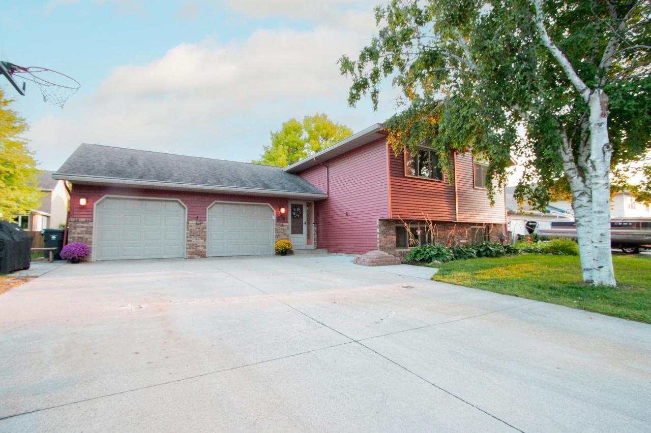 Discover the perfect blend of comfort and flexibility in this inviting 4-bedroom, 2-bathroom split-level home in North Mankato. Thoughtfully designed, it offers a warm and welcoming layout and is ready for its next chapter.
The main level features a bright, open living area that flows easily into the beautifully updated kitchen and dining space—ideal for everyday living or hosting friends. A generous full bathroom as well as the primary bedroom and second bedroom complete the main living level. Just beyond the dining room you step outside onto the deck where you will enjoy times of relaxation, grilling, or just some peaceful summer evenings.
The finished lower level adds even more living space; perfect for entertaining with a space for everyone!  Not to be forgotten, the lower level also boasts two additional bedrooms and another full bathroom. With four spacious bedrooms and two full bathrooms, this home adapts beautifully to all your needs. 
A fully fenced backyard offers both privacy and room to play, while the attached 2-stall garage adds convenience and extra storage.  This property has been maintained responsibly, so all you need to do is move in and enjoy!