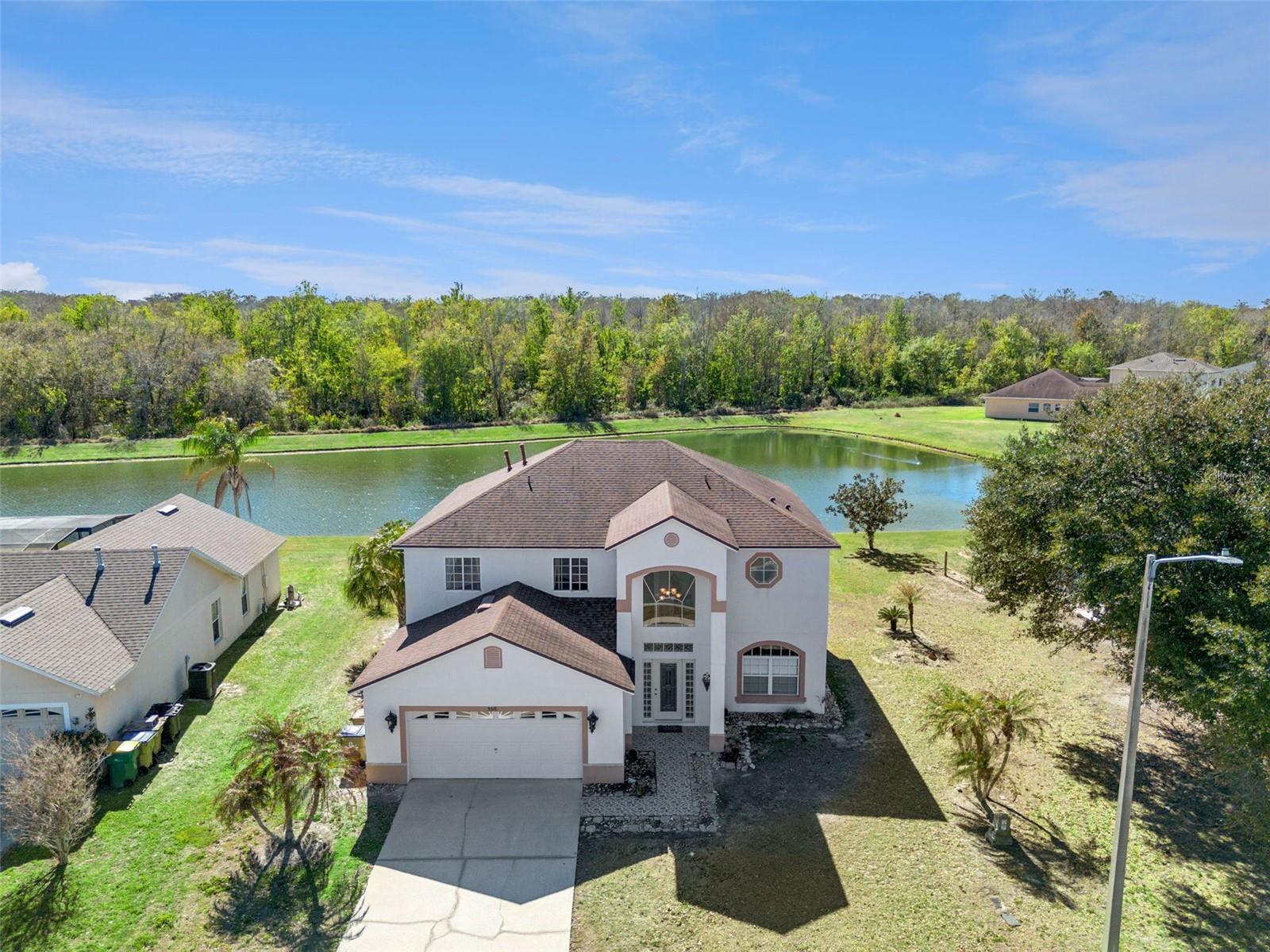 Located within the serene community of Willow Bend at Crescent Lakes, 5516 Willow Bend Trail offers a perfect blend of comfort and entertainment. This fully furnished 5-bedroom, 3-bathroom home features a breathtaking water view that sets a tranquil tone from the moment you arrive. The outdoor living space is a standout, boasting a screened-in private pool designed for relaxation, while the interior features a garage-turned-game room for non-stop fun. Whether you are searching for a move-in-ready primary residence, a seasonal getaway, or a high-yield investment property, this home is uniquely equipped to meet your needs.The Crescent Lakes community provides an array of amenities that enhance the Florida lifestyle, including sports courts, soccer fields, and multiple playgrounds. Beyond the neighborhood, you are perfectly positioned just a short drive from Central Florida’s world-class theme parks, championship golf courses, and an abundance of dining and shopping destinations. Offering the best of both worlds—a quiet retreat with proximity to the action—this property is a rare find in a prime location.