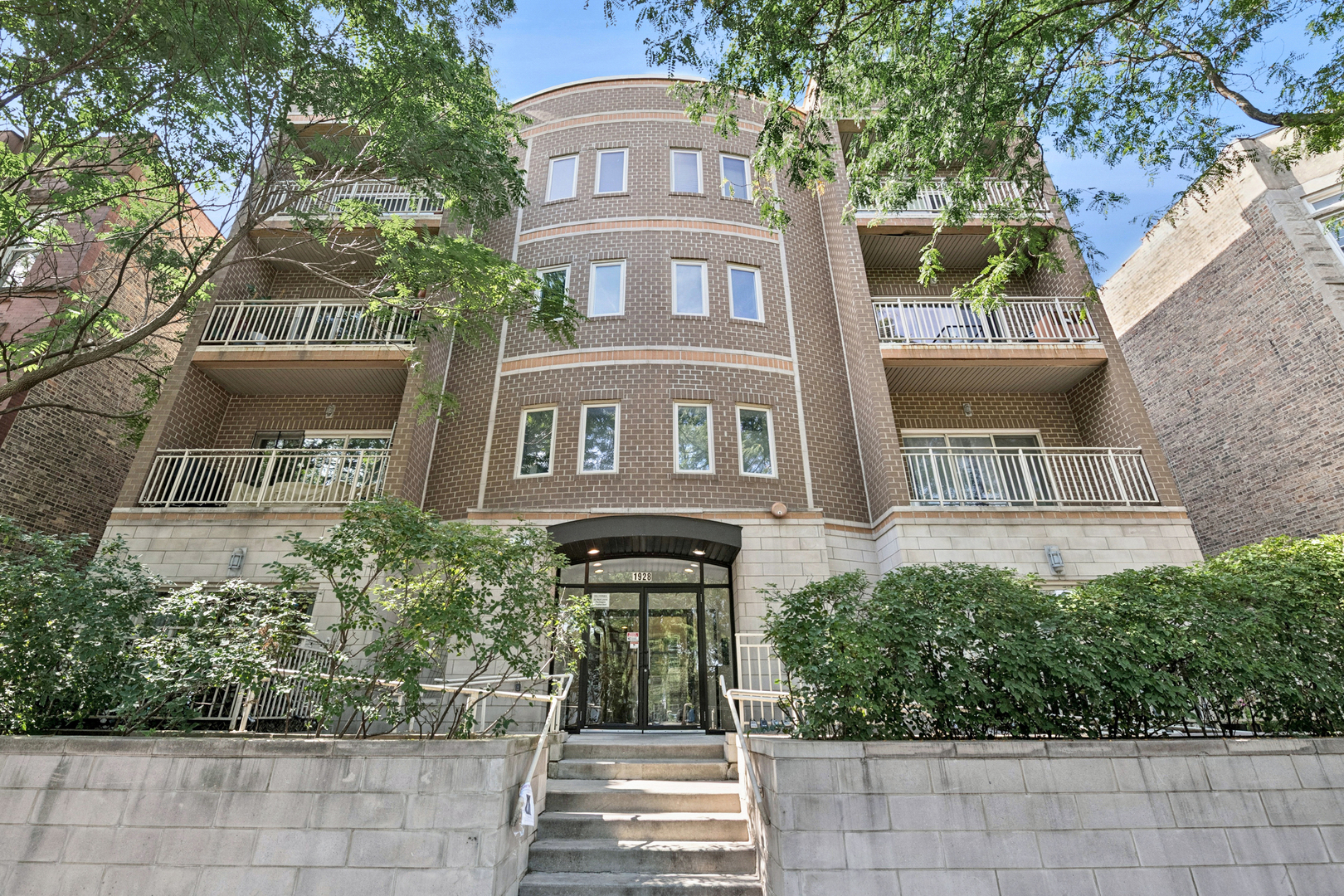 Top-floor 2BD/2BA condo in prime Logan Square! Bright open floorplan with refinished hardwood floors, white shaker cabinets, granite counters and stainless steel appliances. The spacious primary suite includes a walk-in closet and updated bath with dual vanities, soaking tub, and separate shower. Additional features include in-unit laundry, private balcony and attached heated garage parking space in a boutique elevator building. Pet- and rental-friendly, this ADA-compliant building offers a ramped entrance for convenience. Perfect location between The 606 and Palmer Square, steps to restaurants, bars, the Logan Square Farmers Market, and everything the neighborhood has to offer!