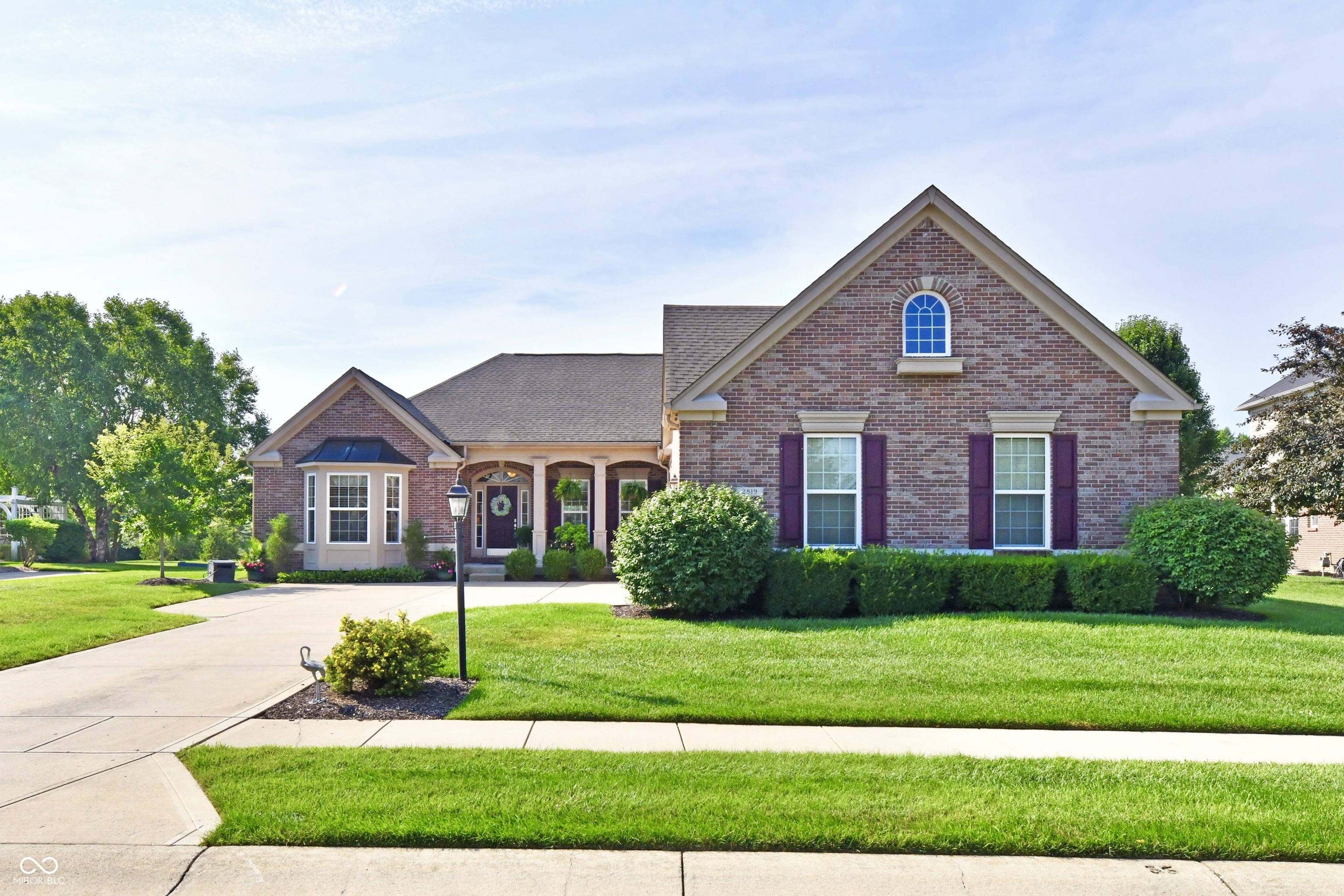 It's everything you've been waiting for and it's in Zionsville! A world of luxury and elegance await you in this spectacular all brick ranch home with full basement in beautiful Brookhaven.  The current owners have loving created and cared for this home. Step into the gracious entry and you'll immeditately be drawn to a dramatic bank of windows in the great room facing the private rear yard.The elegance of the fireplace, trim &  built-ins speak to exceptional quality. The vaulted ceiling and wood floors add dramatic appeal to the great room. The primary bedroom  features a large picture window with tranquil views of the private yard. The ensuite bath includes a garden tub, shower, water closet and walk-in closet. The spacious main floor office with charming bay window is just off the entry. The quality gourmet kitchen has endless cabinets and is open to the great room. The dining room has a lovely view of the front porch and is convenient to the kitchen.  The basement is a real show stopper. The expansive family room is adjacent to the well appointed bar area and the full bath. Another section of the finished area has an egress window. The unfinished area of the basement is vast and awaits the special touch of the lucky new owners, maybe a home theater or fourth bedroom? The 3 car garage includes extra storage which could easily accommodate a golf cart or motorcylce.