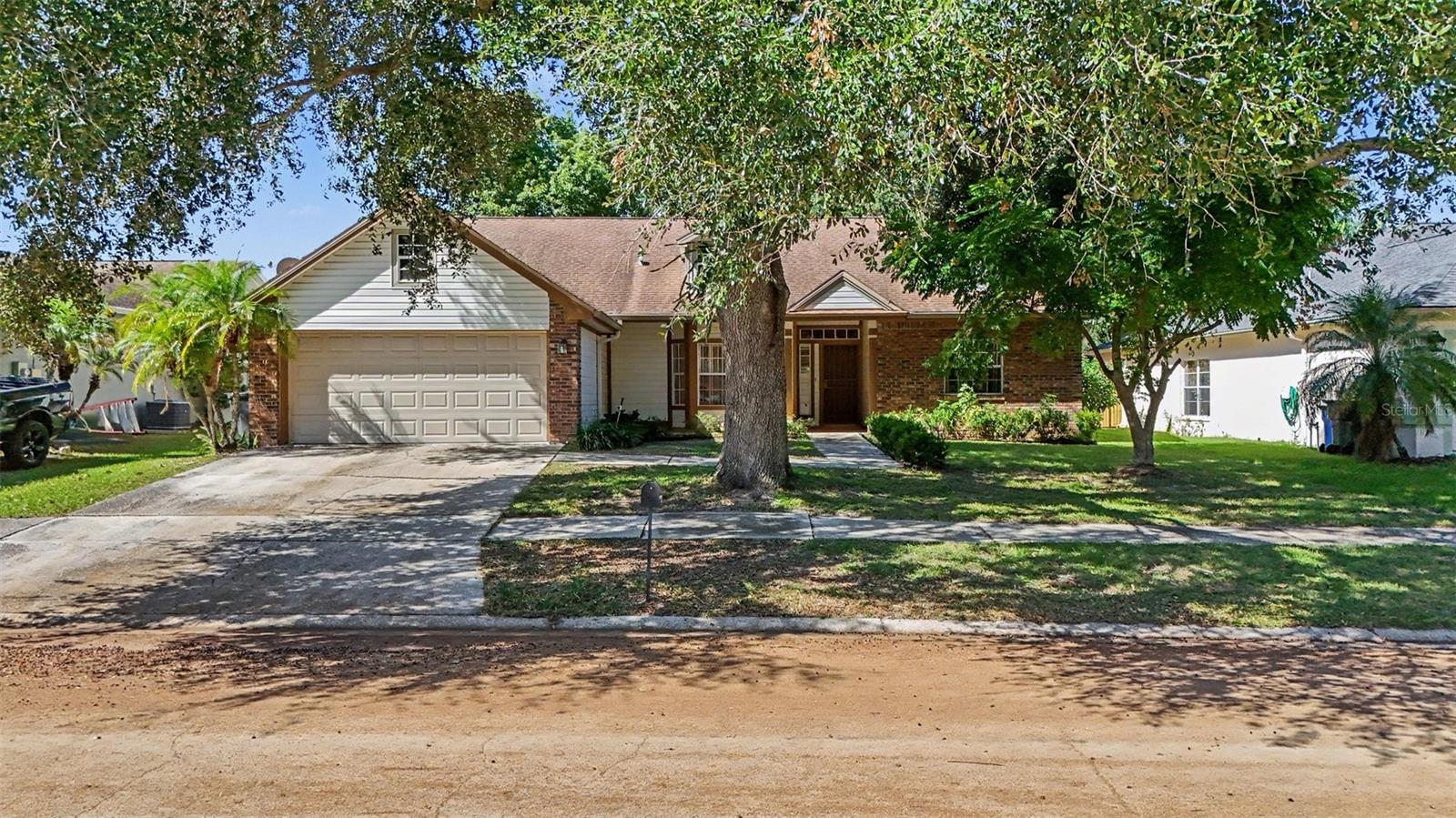 Welcome to this beautiful 3 BEDROOM, 2 BATHROOM HOME nestled in a quiet, established Brandon neighborhood with ONLY ONE ENTRANCE AND EXIT, NO THROUGH TRAFFIC! This home offers a desirable SPLIT BEDROOM FLOOR PLAN, HIGH CEILINGS THROUGHOUT, AND SPACIOUS LIVING AREAS perfect for comfortable everyday living and entertaining. The kitchen features a CONVENIENT CENTER ISLAND offering additional counter space, along with a cozy breakfast nook for casual dining. A LARGE FORMAL DINING AREA provides plenty of room for hosting family gatherings and special occasions. The OVERSIZED PRIMARY BEDROOM offers a comfortable private retreat, complete with a WALK-IN CLOSET and spacious en-suite bathroom featuring DUAL SINK VANITIES, A WALK-IN SHOWER, AND A RELAXING GARDEN TUB. Step outside to enjoy the BEAUTIFULLY LANDSCAPED, FULLY FENCED BACKYARD, surrounded by mature landscaping that creates a peaceful and private outdoor setting. Whether enjoying your morning coffee, entertaining guests, or simply relaxing outdoors, this backyard is a wonderful place to unwind. FANTASTIC BRANDON LOCATION! Conveniently located near shopping, grocery stores, restaurants, Brandon Hospital, and everyday essentials, with easy access to I-75 AND I-4 for commuting throughout the Tampa Bay area. Enjoy the perfect combination of a QUIET, ESTABLISHED NEIGHBORHOOD, SPACIOUS FLOOR PLAN, AND CONVENIENT LOCATION! Schedule your private showing today!