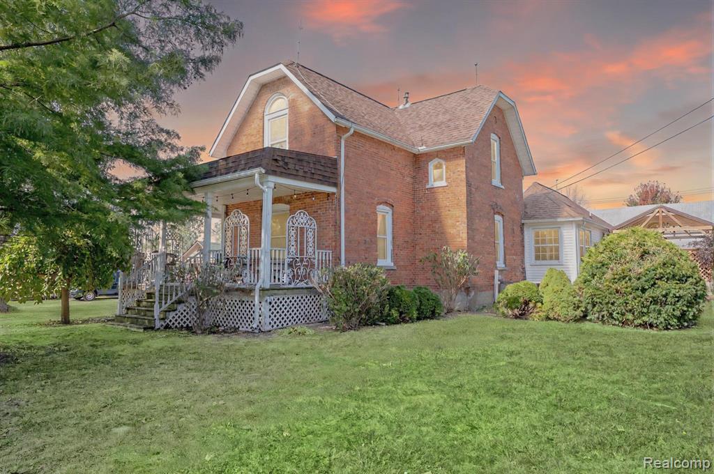 Step into a piece of history and discover the limitless potential of this magnificent 1885 Victorian Style Home, set on a sprawling 1.32-acre lot! This remarkable property offers not just a gorgeous residence but also an exceptional opportunity for your passion project or business venture, thanks to its advantageous B-1 (local business) zoning which permits residential use as well. The home has been meticulously updated for modern peace of mind, featuring updated electrical and plumbing, an on-demand water heater, and a backup generator. The massive 4,500 sq ft, two-level barn with separate utilities is a commercial dream, providing unparalleled storage or workshop space. With a new wood fence, a new 16' x 30' pavilion on the deck for outdoor enjoyment, and the easy potential to add a fourth bedroom by relocating the laundry, this estate is perfectly situated near highly-rated local schools and boasts excellent accessibility to surrounding communities and essential services, defining a truly unique lifestyle.