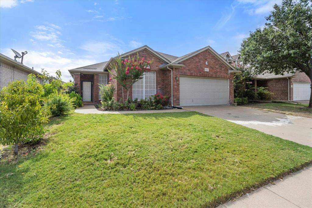 Beautifully maintained 3-bedroom, 2-bath home in The Crossing at Fossil Creek! Ideally located on a landscaped lot just a short walk from the community pool, playground, and soccer field. This open, light-filled floorplan features thoughtful upgrades throughout. The spacious living area with a cozy corner fireplace is adjacent to the bright dining space and kitchen, complete with granite countertops, abundant cabinetry, a stainless gas range, built-in microwave, refrigerator, and breakfast bar. A versatile study with arched entries and custom built-ins offers the perfect spot for a home office or flex space. The large primary suite includes dual sinks, a separate tub and shower, and an oversized walk-in closet. Relax on the covered back porch overlooking a backyard planted with fruit trees and roses. Additional highlights include engineered wood and tile flooring in most areas, 2-inch blinds, a new WiFi-enabled garage door opener, and a convenient location just a short walk from Fossil Creek Park. Pre-inspection already completed for your convenience.  Move-in ready and one you won't want to miss!