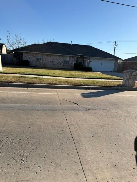 Adorable! Great location for families, as it is walking distance to the Elementary school. Updated paint, flooring, newer roof and fence, master shower renovated and new toilets and faucets. Features a walk in closet in the primary suite that is also a storm shelter with an additional closet for additional storage! This home is move in ready!!