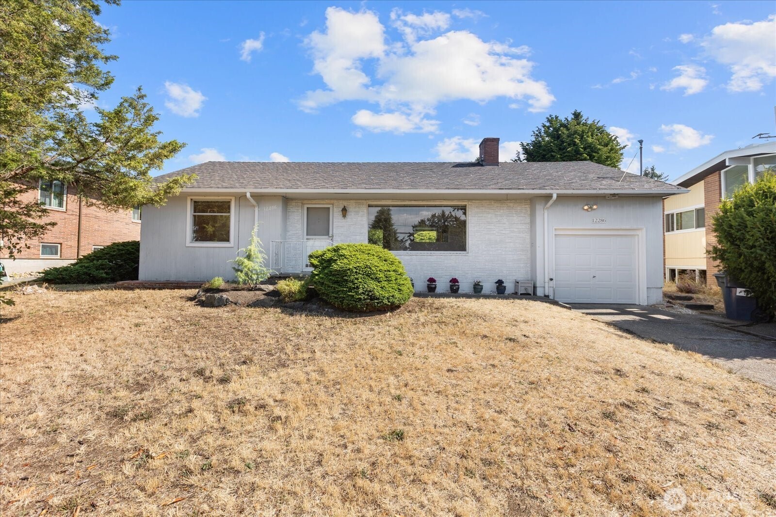 {{An opportunity in the Shorewood Seola Beach neighborhood}} with the fundamentals that are increasingly difficult to find. A generous lot, Sound and mountain views, a single-level footprint, and a location with lasting appeal. This 4-bedroom, 1-bath home offers 1,531 square feet on almost a quarter-acre lot, providing a strong canvas for a thoughtful renovation or complete reimagining. The existing layout includes living & dining areas, hardwood floors, a fireplace, and a kitchen positioned for connection to the main living spaces. The home offers an opportunity to bring the interiors forward while retaining the character, footprint, and features that make this single-level property compelling. Outside, the gently sloping lot and private rear yard create additional flexibility for an addition or an ADU, landscaping, outdoor living, and future vision. An attached garage adds practical value, while community beach access and sound views elevate the setting beyond the typical renovation opportunity. For those looking for a project in a highly desirable Seattle-area neighborhood, this is a chance to take an existing footprint and create something distinctly your own. Walking distance to parks and trails. NEW Heat Pump, Water Heater, replumbed with PEX, New water line from the street, and new electrical panel for added value.