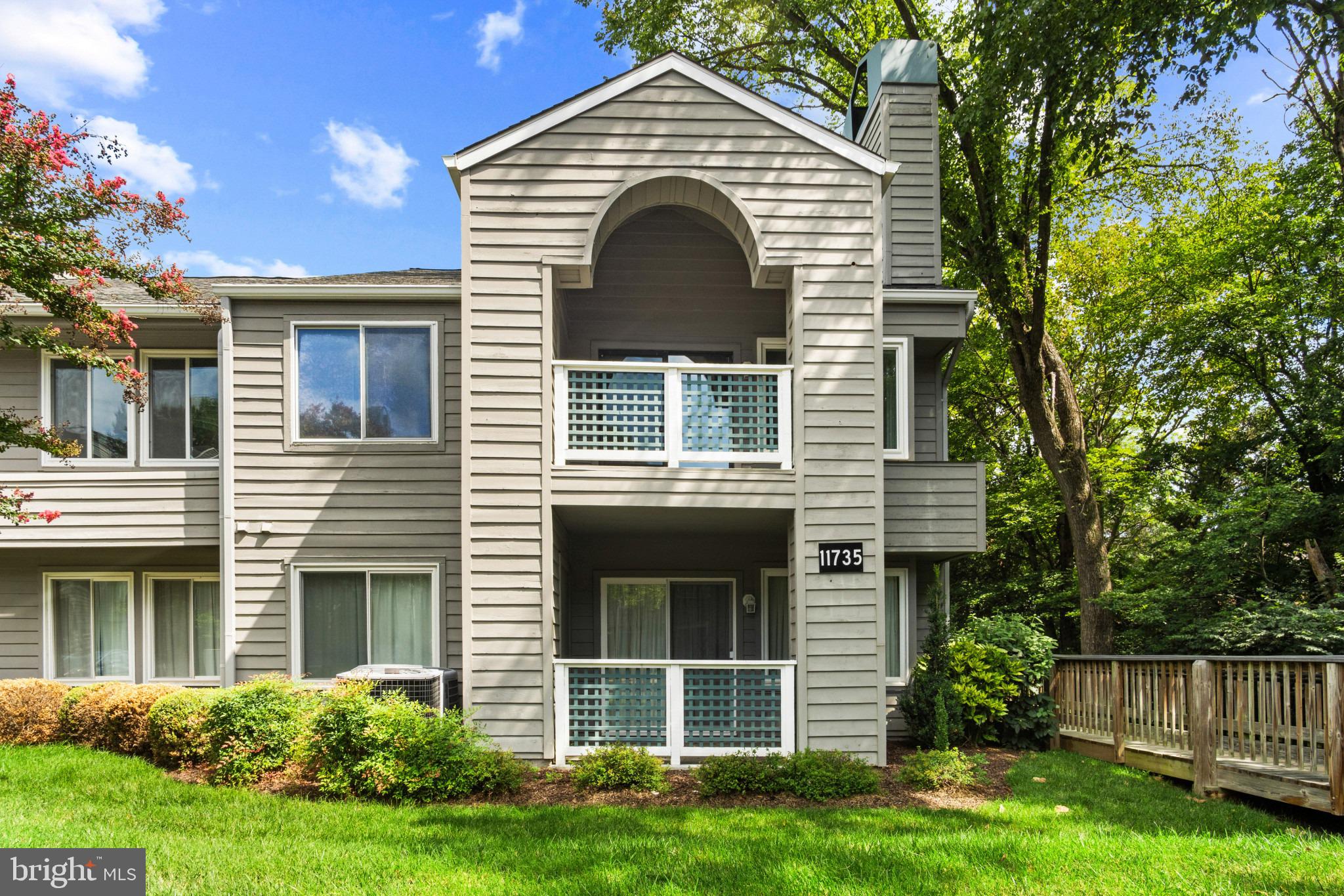 Welcome to North Reston and the sought-after Summer Ridge community! Tucked in a private, setting, this remodeled top-floor 2-bedroom,1-bath condo offers a bright and airy layout enhanced by vaulted ceilings and abundant natural light. On the top floor, but up only one set of stairs, this unit has multiple significant upgrades, including granite countertops, stainless steel appliances, wood cabinets and upgraded carpeting. The main living area features a cozy wood-burning fireplace and an open flow into the dining area and kitchen, creating a comfortable space for everyday living and entertaining. Just off the living room, a private balcony provides a peaceful outdoor retreat with scenic treed views and a full-sized outdoor storage closet. The home includes two well-proportioned bedrooms with surprisingly generous closet space. The primary bedroom features a second closet, a dedicated dressing area, and an upgraded private vanity space with an additional full closet, offering added convenience and functionality. A full bathroom and an in-unit full-sized, stacked washer and dryer complete the interior. Residents enjoy ample parking for both owners and guests, along with access to community amenities such as walking trails, playgrounds, and nearby parks, pools, and sports courts. The location offers convenient access to a variety of shopping, dining, and everyday services at Reston Town Center and surrounding retail areas, particularly North Pointe center. Commuters will appreciate close proximity to bus routes,  Dulles Toll Road, Fairfax County Parkway, and the Wiehle–Reston East Metro station, providing multiple options for travel throughout Northern Virginia and into Washington, DC. This rarely available top-floor unit combines comfort, privacy, and a convenient location—ready for its next owner. Schedule your tour now!