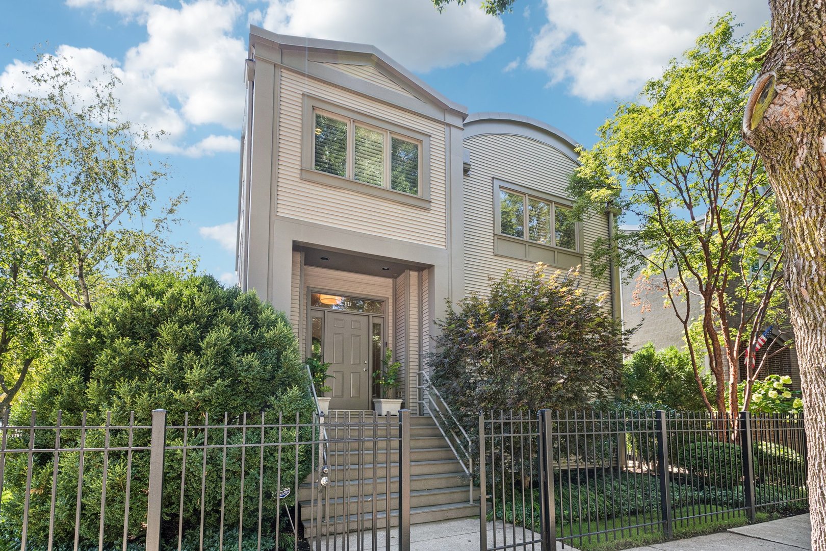 WELCOME TO 1703 W. WABANSIA, A STUNNING COMPLETELY DESIGNER-RENOVATED AND METICULOUSLY MAINTAINED  4 BEDROOM 3.5 BATHROOM SINGLE FAMILY HOUSE ON ONE OF THE MOST BEAUTIFUL TREE-LINED STREETS IN SOUGHT AFTER BUCKTOWN. This home sits on an oversized corner 49 x 93 foot lot. As you step inside, a sense of luxurious Zen beauty envelops you when you see the bright sun-filled open concept dining/piano/living rooms with a gas fireplace overlooking the lush back yard. The chef's kitchen features custom Plain and Fancy stained rift cut white oak cabinets adorned with Rocky Mountain hardware, a Wolf 36" 6-burner stainless Steel stove top, a Wolf 30" single oven E series, a Wolf 24" convection steam oven, a Miele dishwasher, a sub-Zero refrigerator/freezer, Franke sink with Dornbracht faucet and air switch control for the disposal.  The 91" long island with seating for 4 and counters are clad in granite and quartzite with suede finish, the backsplash is Italian Neoglass, under and over cabinet lighting and under cabinet electrical outlets. The adjacent cozy family room with views of mature trees and of the Ipe deck features custom cabinetry with display and storage cabinets and integrated LED lighting.  The entire first floor has dark stained maple wood flooring. A generous hall closet and a powder room complete the main floor. Three bedrooms and 2 bathrooms are on the 2nd level which is flooded with light coming from four Velux skylights. The entire 2nd floor is carpeted in Masland wool and multiple custom built-ins. The serene primary bedroom features a gas fireplace, a large walk- through closet, an en-suite primary bathroom with Ann Sacks honed marble floor and tub deck and Ann Sacks pebbles shower flooring.  The vanity is custom Asian Elmwood. The full height renovated lower-level features an oversized recreation room with a plumbed area for a wet bar as well as a 4th bedroom, a full bathroom and a laundry room equipped with side-by-side washer/dryer, sink and Scavolini lacquer cabinets. The flooring on this level is Tundra Luxury Vinyl tile. You will be blown away by the huge 14 x 16 storage room. The top-of-the-line infrastructure includes: Bryan A/C condenser and furnace, Honeywell thermostats, Aprilaire large fan powered humidifier, 2 A.O. Smith 50 gallon water heaters, an ejector pump, an alarm system controlled via smart phone. The roof has de-icing wires to assure snow and ice do not accumulate and all the gutters have RainDrop gutter guards. Vinyl exterior cladding.  The home is fully wired for Ethernet.  ALL WINDOWS AND DOORS HAVE BEEN REPLACED BY MARVIN ONES.  The attached garage is accessed via a commercial grade black iron electronic fence across the driveway from Paulina Str. and not from an alley. The lush professionally designed and maintained garden features a bluestone patio, Ipe wood deck, property wide automatic irrigation system, automated lighting system in the back garden, a granite sculpture and a peaceful gurgling water feature. Located a few blocks from the 606 trail, the Milwaukee/Western Blue Line stop, quick access to the highway and from the best shopping and trendiest restaurants. Close to great schools: Burr, St Mary of the Angels, Drummond Montessori, Bennett Day, Talcott and more. CALL THIS EXCEPTIONAL MOVE-IN READY RESIDENCE YOUR OWN HOME AND YOU WILL LOVE LIVING IN PEACEFUL TIMELESS ELEGANCE!