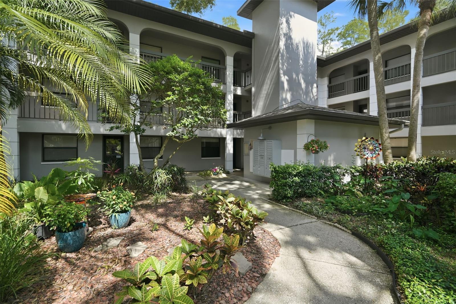 Welcome to 3399 Mermoor Drive #105, located the beautiful Ridgemoor community in the desirable East Lake area of Palm Harbor! This beautifully refreshed 2-bedroom, 2-bath condominium offers over 1,000 square feet of comfortable living space and is the perfect opportunity for buyers seeking a clean, move-in ready home with the ability to add their own personal style over time.Recent improvements include fresh interior paint and brand-new carpeting throughout, creating a bright, inviting atmosphere from the moment you step inside. The spacious living and dining area opens to a private screened lanai, providing the perfect place to enjoy your morning coffee or unwind while taking in the peaceful Florida surroundings. The functional kitchen offers plenty of cabinet and counter space, while the split-bedroom floor plan provides privacy for both owners and guests. The generous primary suite features a walk-in closet and an en-suite bathroom, and the in-unit laundry adds everyday convenience.Ridgemoor is a gated, beautifully maintained community offering residents a heated swimming pool, clubhouse, car wash station, and access to the master association's scenic walking and biking trails, tennis courts, basketball courts, and playground. Monthly condominium fees include water, sewer, trash, basic cable, exterior maintenance, grounds maintenance, building insurance, reserves, and recreational amenities for truly low-maintenance living.Ideally situated just minutes from John Chesnut Sr. Park on Lake Tarpon, Lansbrook Golf Club, the YMCA, shopping, dining, medical facilities, and top-rated Palm Harbor schools, this home offers an exceptional combination of location, value, and lifestyle. Whether you're searching for a year-round residence or a seasonal Florida retreat, this is an opportunity you won't want to miss!