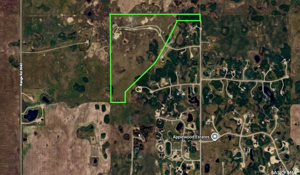 This 80-acre property, located just 5 km from Saskatoon and directly off a paved road, offers a rare combination of privacy, prime location, and future development potential. Providing the perfect balance of seclusion and convenience, it is tucked away from surrounding properties, among the desirable Hidden Ridge Estates acreages.  The property features a Carriage house, 1232 sq. ft. residence with an open-concept, loft-style design. The three-car (24'x36')heated garage also serves as utility room for drip system holding tank, HWT and connects to an indoor kennel and dog run. There is a spacious mudroom, 2 pc bathroom and office/laundry on the ground floor. The second floor features an open concept kitchen/ dining room and spacious living room with great views of the property. The primary bedroom has lots of space for another work space. In the evening, the Saskatoon city lights provide a spectacular view of the western sky.Additionally, there is a 40' x 80' shop divided into 3 sections. The center section is fully equipped with in-floor heating, power and roughed in plumbing and two side storage sections are used for cold storage, providing ample space for business operations, hobbies, or equipment storage. The property also has perimeter fencing.Zoned D-Agricultural District (DAG1), this parcel benefits from low taxes and offers a variety of discretionary uses, including residential, livestock, equestrian, bed and breakfast or a home-based business. The property also has potential for subdivision and development within the P4G planning district.  The zoning allows for multi-parcel residential subdivision. This makes it an excellent opportunity for developers or use as a potential investment for future resale. This acreage combines a private, peaceful setting with easy access to urban amenities. Call today