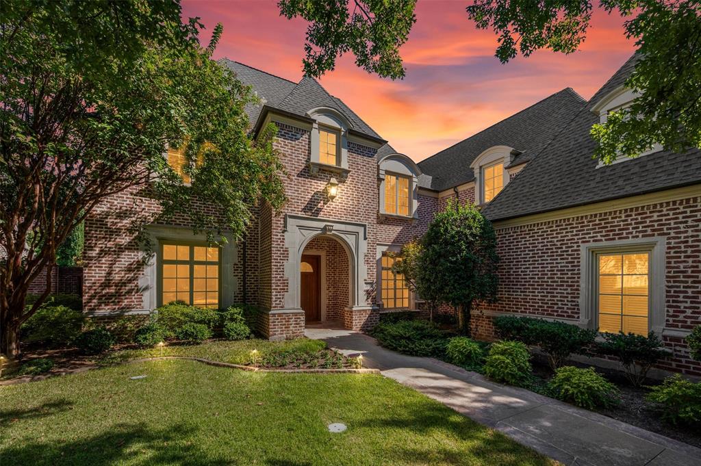 COMPELLING PRICE with strong equity potential!! Choicest neighborhood --Nestled within the Villages of Stonebriar Park, a premier guard-gated enclave in Frisco, this timeless traditional masterpiece built by highly respected Hawkins-Welwood builders and designed by renowned architect house of Robbie Fusch, Serold & Partners sits gracefully on a coveted, rare .34-acre treed lot. Large windows throughout the home frame views of the scenic yard & flagstone hardscape areas. Expansive 36 foot veranda looks out past a tranquil creek to a neighboring acre lot, creating a sense of serene privacy and park-like views. Inside, the home blends sophistication and scale with hardwood floors, high-quality millwork and a timeless design cast stone fireplace.  Soaring 2-story ceilings elevate the kitchen and connects to the beamed & vaulted living room. Many updates by current owner, the kitchen features a rare, leathered quartzite that becomes the focal point of design. Art lovers will enjoy the plentiful walls in which to display art!  The versatile second story is a haven for collectors, hobbyists, multiple offices or downsizers just needing large rooms, massive closets and vast shelved storage . The third-car bay of the tandem garage has been seamlessly converted into a dual-purpose layout featuring a generous storage room and a dedicated pet suite, complete with a dog door and passenger door that exits to the secure side yard. This residence has been exceptionally maintained and loved and it shows! A great opportunity to be nestled in a neighborhood with luxury properties priced much higher!  WALKABILITY is a 10! The Ford Center and The Star is so convenient! Seneca is a quiet, peaceful double ended cul-de-sac street that won't disappoint! NOTE: ALL FURNITURE IN PHOTOS HAS BEEN VIRTUALLY STAGED. THE LIBRARY AND DINING ROOM HAVE BEEN VIRTUALLY PAINTED WHITE TO SHOW OPTIONS.