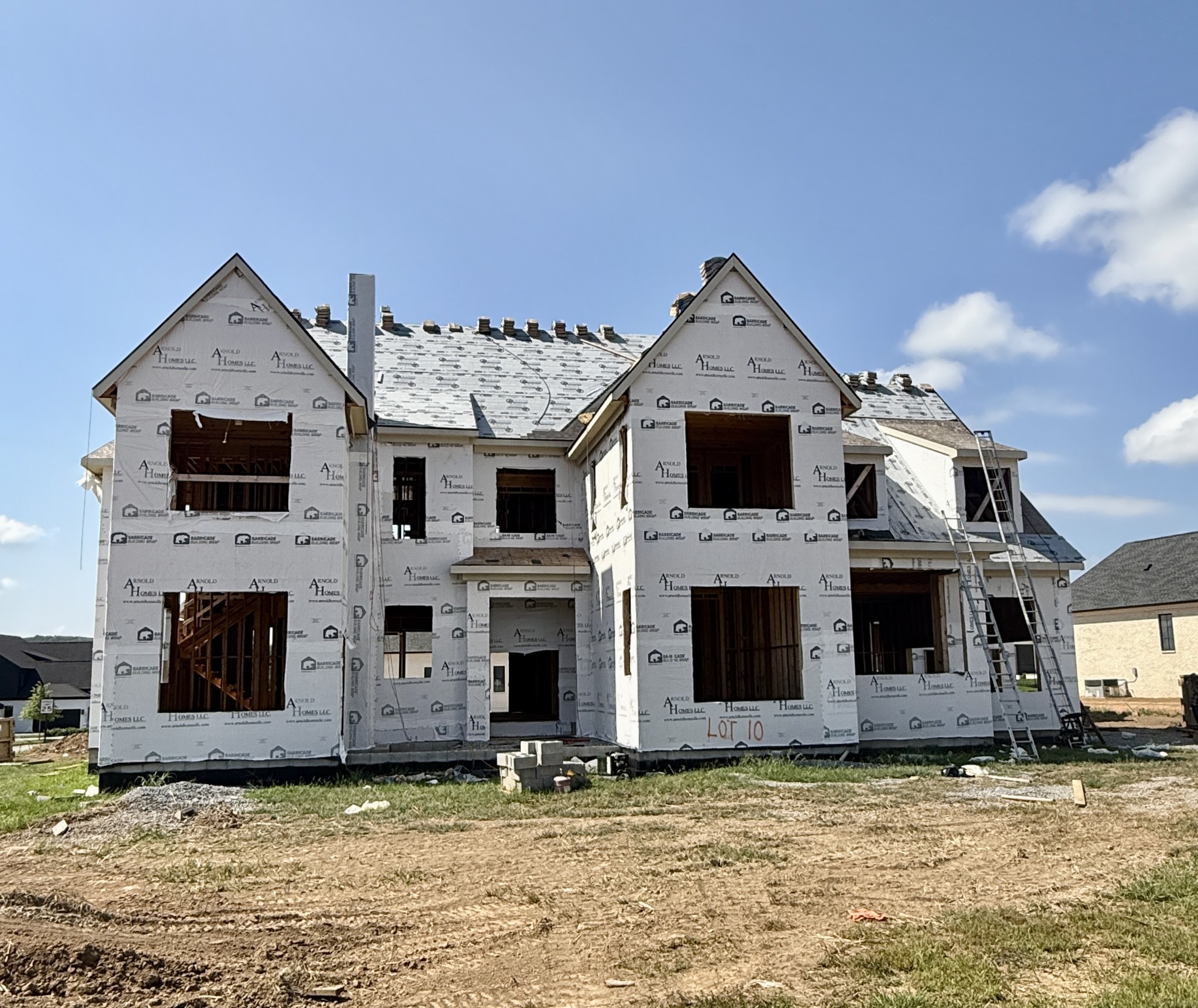 This custom home by award-winning Arnold Homes is under construction in the highly sought-after Primm Farm. Featuring a courtyard entry that connects to both the main entry and office, the home welcomes you with an open-concept design. A wet bar overlooks the Great Room and Dining Room, while the spacious kitchen boasts an industrial stove and oven, a separate refrigerator and freezer, and connects to a prep kitchen/pantry with an additional oven, microwave, warming drawer, dishwasher, sink, and space for a second refrigerator. Designed for seamless indoor-outdoor living, the covered porch includes a grilling station and fireplace, with convenient access to the pool bath and main-level bonus room with a wet bar. The luxurious Primary Suite offers spa-like amenities and two oversized closets. A guest suite is also located on the main level, while the upper level includes three additional bedrooms with ensuite baths, a second bonus/media room with a wet bar, and a loft with built-ins. Additional features include upper and lower laundry rooms, a four-car garage with a garden storage center and friends’ entry. Enjoy your very own backyard oasis with covered porch and in ground pool. Hurry to choose your finishes! Photos represent an Arnold Homes floor plan with the same level of quality and finishes. $50,000 builder incentive to buyer with accepted contract by May 16, 2025.