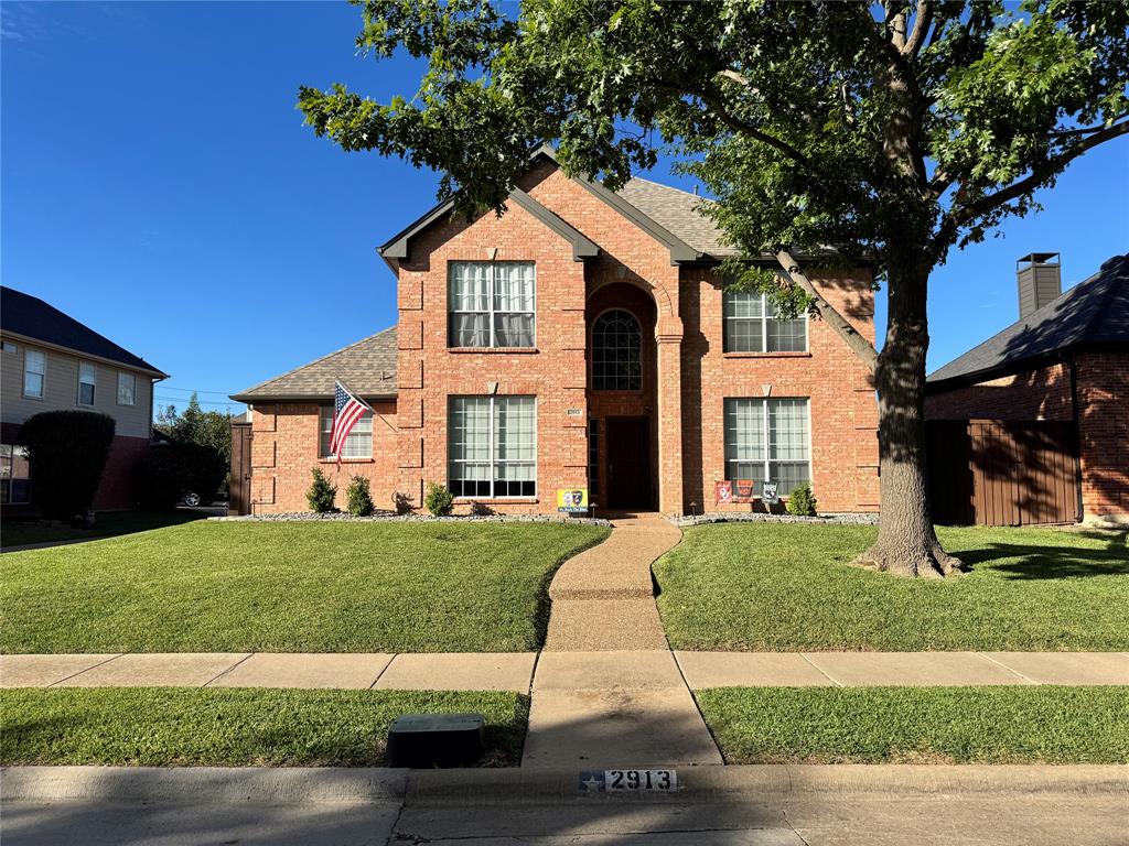 Welcome to 2913 Val Verde Drive in Plano, Texas! Situated in an established neighborhood, this spacious 5-bedroom, 3-bath home offers a versatile floor plan, inviting living spaces, and exceptional outdoor amenities designed for everyday comfort and entertaining. The main level features two bedrooms, two dining areas, and a welcoming living room highlighted by a custom paneled accent wall and a beautiful corner fireplace with gas logs. The kitchen features granite countertops, a gas cooktop, and plenty of space for preparing meals and gathering with family and friends. Upstairs, you'll find three additional bedrooms and a spacious media room, perfect for movie nights, game days, or entertaining guests. Step outside to your own private backyard retreat featuring a large deck with a cedar pergola, an oversized 8-person hot tub, and an impressive 8-foot cedar board-on-board privacy fence. A convenient carport provides additional protection for your vehicles from the Texas weather. Ideally located with easy access to major thoroughfares, shopping, dining, entertainment, and nearby parks, this home offers the perfect combination of comfort, functionality, and convenience. Whether you're searching for your next home or an investment opportunity, this property has plenty to offer. Schedule your private showing today!