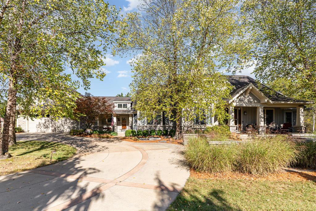 This unique high-end custom home showcases exceptional craftsmanship w/ rich hardwood floors, detailed trim, solid craftsman doors, decorative wainscoting, & coffered ceilings. The built-in shelving &  library highlight the artistry throughout.  The main-level office offers flexibility for use as an additional bedroom. The expansive chef's kitchen offers Sub-Zero & Wolf appliances, solid wood cabinetry, granite counters, & decorative tile backsplash. The walkout basement is designed as a full living space for entertaining. Enjoy beautiful views of your retreat, from the composite deck or patio which adds space for gatherings, relaxation & taking in the lush landscape. The outdoors of the property is designed for both function & leisure with a large custom play structure, stocked pond with four bubblers, fountain, and gazebo. Truly a one-of-a-kind property blending timeless style and modern amenities, built by Stevens Associates Builders.Supplemental Mechanical & Property FeaturesThis property offers extensive mechanical updates and unique pond enhancements for ease of ownership.Wells & Water Systems: The home features a constant-pressure well with a new control panel (2025) and a separate well dedicated to the pond.Pond & Fountain Systems: The pond was professionally dug and improved by Michigan Ponds, who also installed a new pump system for the bubblers. The fountain system, though not currently installed, connects to the black PVC pipe near the rowboat for future hookup. The pond is stocked with koi, bluegill, and sunfish. The walkway, gazebo, and lighting were completed approximately four years ago. The pond includes an overflow pipe designed to protect fish by draining into the marsh and a fill pipe near the rowboat for adding water with a natural rock waterfall effect if levels run low. Decorative landscape lighting with multiple timer options surrounds the pond and walkways.Heating & Cooling: There are two furnaces, each with Wi-Fi thermostats. The basement furnace includes four zones, and the upst