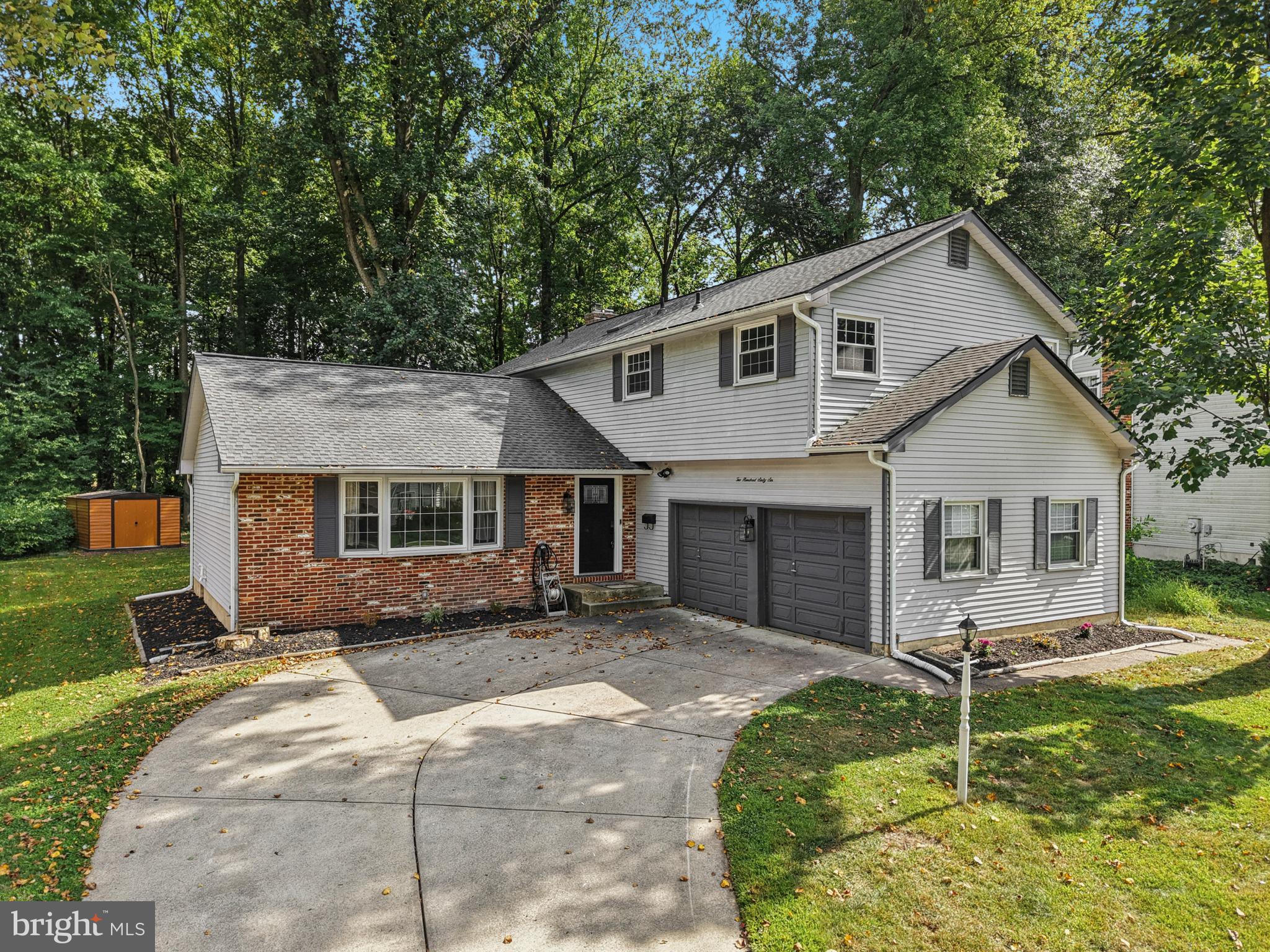 Welcome to 266 St David Drive in the sought-after Mill Run neighborhood of Mount Laurel. With 2,362 square feet of well designed living space, this northeast facing, 4 bedroom, 2.5 bathroom home offers a comfortable blend of timeless charm and fresh, modern updates.Step into the foyer and you'll immediately notice the brand new hardwood flooring that continues through the living room and dining room—adding warmth and style to the main level. The adjacent family room features new tile flooring and a whitewashed brick fireplace with a matching hearth and mantle, creating a welcoming space to gather or unwind.The staircase has been tastefully updated with a wood banister and wrought iron spindles, giving the entry a contemporary touch that sets the tone for the rest of the home. Once up the stairs, you will notice the hardwood flooring leading to the bedrooms has been refinished to a beautiful sheen, complementing the freshly painted interior throughout the home. All bathrooms have been thoughtfully renovated, offering sleek finishes and modern convenience. Additional recent upgrades include a new 50 year roof and gutter guards, offering peace of mind and long term value. The kitchen is also equipped with modern appliances, including a microwave less than a year old, and a dishwasher, oven, and refrigerator all just 3 years young, plus a 4 year old stovetop.Out back, the property opens to a private yard that backs to mature trees, providing a peaceful setting for relaxing or entertaining.Located just minutes from shopping, dining, and major commuter routes, this home also sits within a well rated school district—making everyday life more convenient and connected.Don’t miss the opportunity to tour this thoughtfully updated home in one of Mount Laurel’s most established neighborhoods.