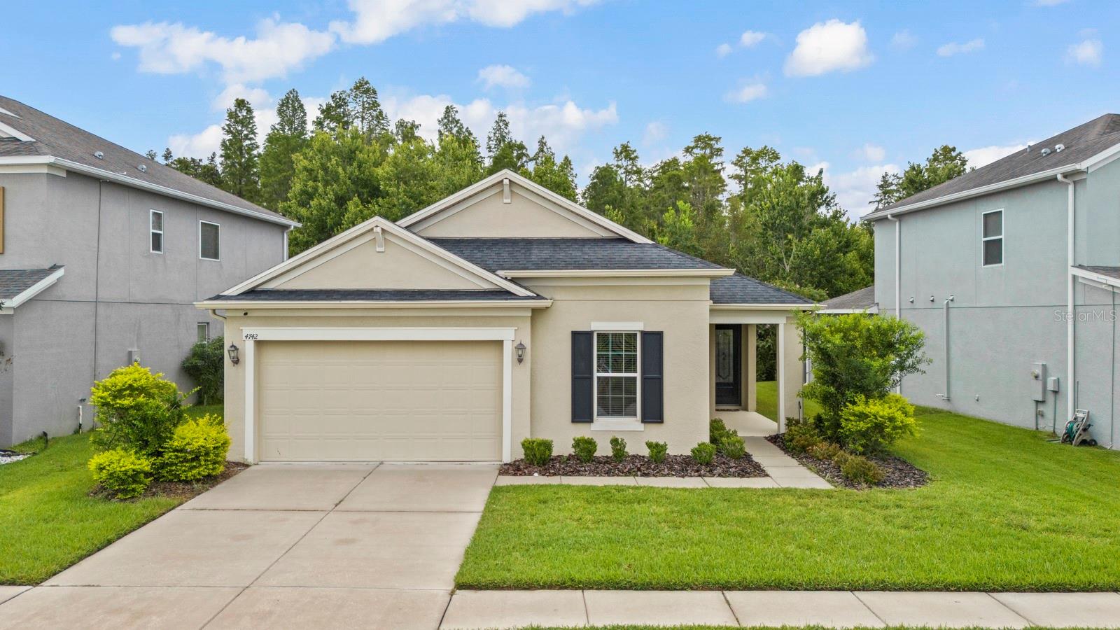Welcome to this beautiful 4-bedroom, 2-bathroom single-family home offering the perfect blend of comfort and privacy—all on one convenient level. The open-concept layout features a spacious living and dining area that flows seamlessly into the large eat-in kitchen, complete with stone countertops, ample cabinetry, and plenty of space for gatherings.

The expansive primary suite boasts a generous walk-in closet and a luxurious en suite bathroom with dual vanities, a soaking tub, and a separate shower. All bedrooms feature brand-new carpet, providing a fresh and inviting feel throughout.

Step outside to the oversized screened-in back patio, perfect for relaxing or entertaining, with peaceful views of the nature preserve—no rear neighbors for ultimate privacy. Located in a quiet, well-maintained neighborhood with excellent amenities, this home offers the ideal combination of tranquility and convenience, close to shopping, dining, and more.