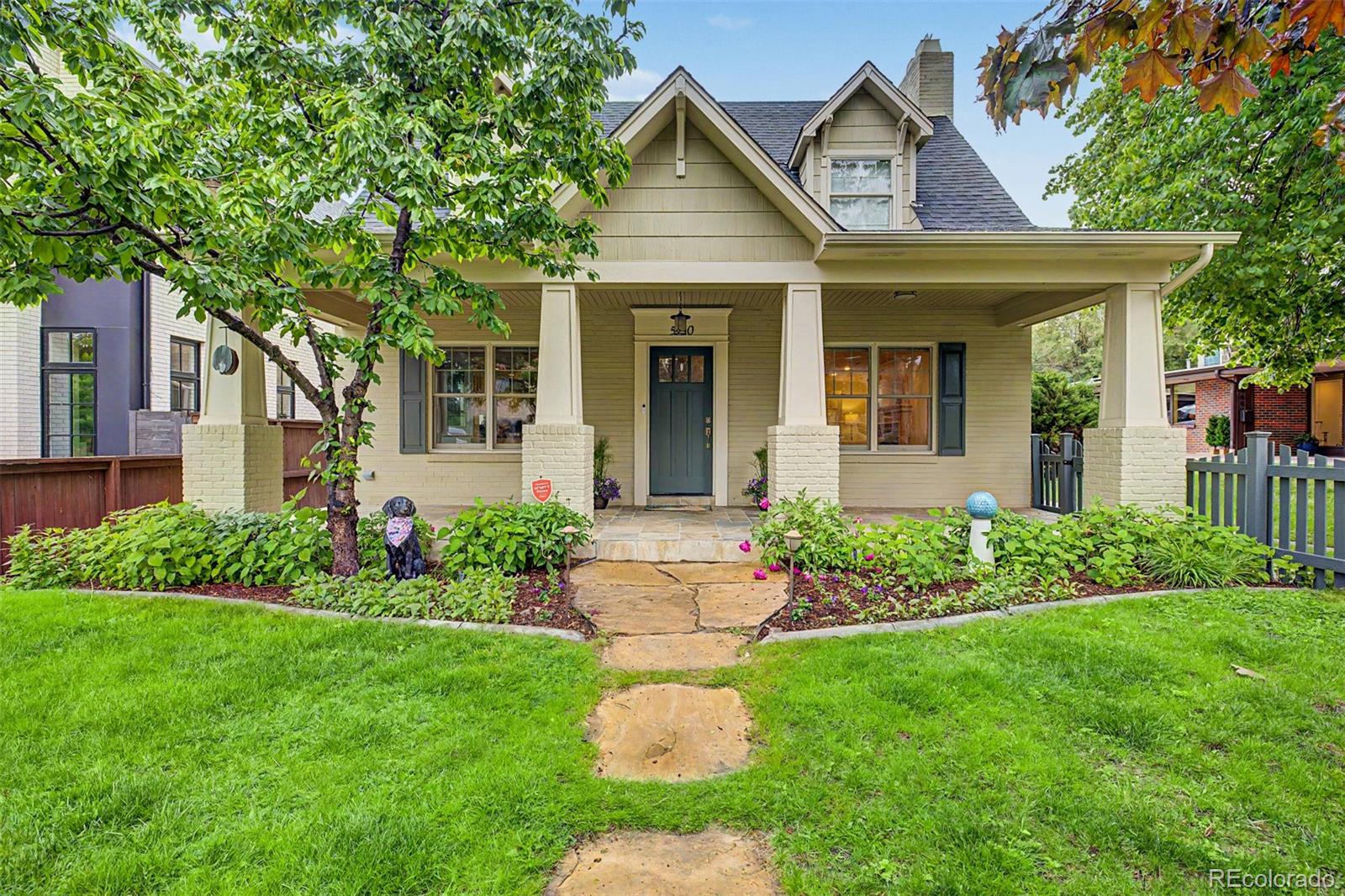 500 Glencoe sits in the heart of Hilltop, one of Denver's most sought-after neighborhoods, a short walk from Denver Tennis Club and the tree-lined streets that define this part of the city. The 1947 brick exterior with covered front porch and freshly landscaped grounds sets a tone that carries all the way through 3,505 square feet of thoughtfully designed interior space.Inside, rich hardwood floors run throughout the main level, where coffered ceilings connect the kitchen and dining room under a crystal chandelier. The living room anchors the home with a limestone fireplace surround, crown molding, and French doors opening to a private den. The kitchen is the room buyers remember: white cabinetry to the ceiling, a dark granite island with a gas cooktop, a pass-through window to the dining room, and a wine cooler built into the appliance suite.The expansive primary suite on the upper level features wide-plank hardwood floors, recessed lighting, direct laundry access, a generous walk-in closet, and a dedicated mini-split for year-round comfort.The primary bath includes a skylight, double granite vanities, and cream cabinetry. Two additional upper bedrooms share a full bath. The finished basement adds a fourth bedroom, a bonus room, and a three-quarter bath, giving the home real flexibility for guests or a home office setup. Detached two-car garage. Fully fenced. Zoned for Carson, Hill, and George Washington.This home is ideally situated near the Denver Tennis Club, which offers perimeter neighbors "fast-track" admission despite the 3-year waitlist & a kids camp for members and non-members alike. Walk from this location to 3 of Denver's best parks or take a short bike ride to nearby Cherry Creek or 9th+CO for some of the City's best shopping and restaurants