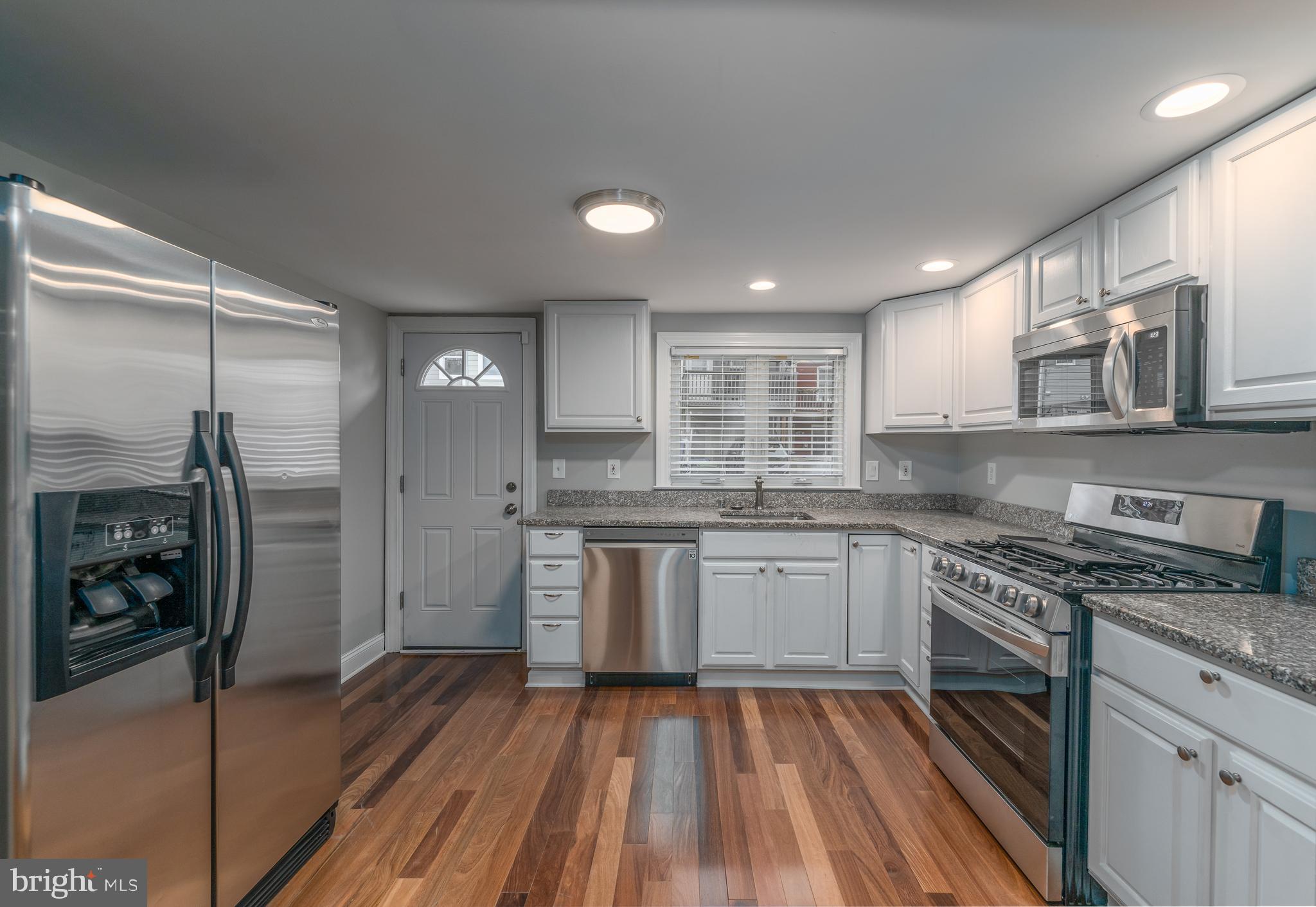 Set on a charming block in the heart of Canton, 915 S Bouldin Street offers the kind of everyday ease that makes city living feel effortless—off-street parking, a wide-open layout, and a location that puts the neighborhood at your doorstep.Inside, the home opens to a sun-filled, expansive main level designed for both daily living and entertaining. Warm wood floors, recessed lighting, granite countertops, and stainless steel appliances create a polished yet comfortable atmosphere, while the generous dining area and convenient main-level powder room make hosting seamless.Upstairs, two spacious bedrooms provide flexible living options—ideal for a primary suite, guest room, or home office—paired with a full bath and bedroom-level laundry for added convenience. The finished lower level offers valuable bonus space, perfect for a second living area, workout room, or creative studio.Step outside and enjoy everything Canton is known for: waterfront walks, neighborhood cafés, local restaurants, and easy access to downtown and major commuter routes—all from a quiet, residential street.Renovated, well-located, and thoughtfully laid out—this is Canton living at its best.Application & Move-In Terms:• $50 application fee per applicant via RentSpree• Minimum credit score of 650• At lease offering: first month’s rent, $50 move-in fee, and security deposit due