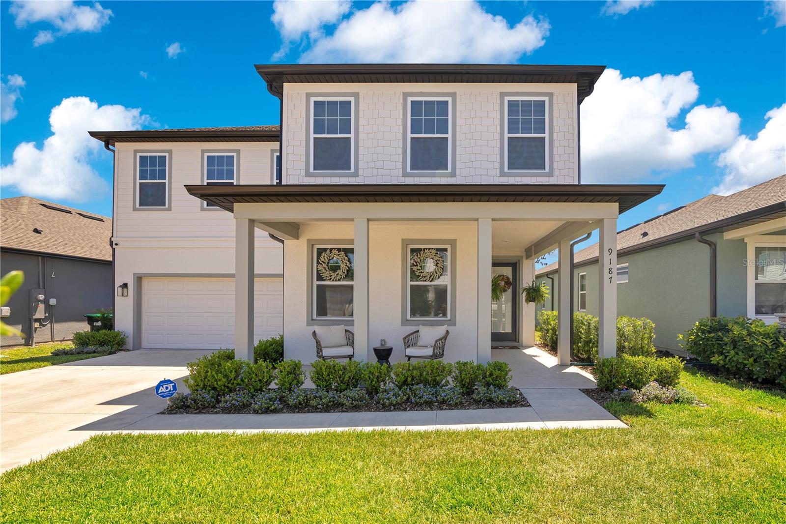 This stunning four-bedroom, three-bathroom Ashton Woods home is a modern masterpiece in the heart of Orlando! Located near the University of Central Florida, top-rated shopping, dining, and entertainment, this nearly new home showcases sleek design, premium upgrades, and thoughtful details throughout.

Step inside to an open and inviting floor plan designed for both entertaining and everyday living. The bright and airy living area features large windows that fill the space with natural light. The gourmet kitchen boasts stainless steel appliances, quartz countertops, soft-close cabinetry, and a large navy-blue island, perfect for meal prep and gathering. The spacious and inviting family room, featuring soaring walls that create an open, airy feel. and a built-in electric fireplace serves as the centerpiece, adding warmth and character to the space.


Enjoy water views from the upgraded dining area or unwind on the extended covered lanai, complete with tile flooring, two motorized screen enclosures, and market lights for year-round outdoor living.

Upstairs, the luxurious primary suite offers a true retreat with a soaking tub, dual vanities, and a walk-in shower with multiple shower heads. Three additional spacious bedrooms provide ample comfort and flexibility, while the downstairs bedroom and bath offer the ideal setup for guests or multi-generational living.

This home is filled with high-end upgrades, including engineered wood flooring in all bedrooms,  Philips HUE smart lighting, motorized blinds, two Nest thermostats, Yale electronic keypads, a whole-house water filtration and softener system, reverse osmosis in the kitchen, and whole-home surge protection. Exterior enhancements include seamless gutters, upgraded landscaping, and a soon-to-be-installed backyard fence for added privacy.

Additional features include upgraded elevation and structural additions, fiber internet, POE home security system, whole-house wireless access points, and updated A/C capacitors—ensuring comfort and convenience in every detail.

Move-in ready and perfectly located, this home truly combines luxury, technology, and Florida living at its best!