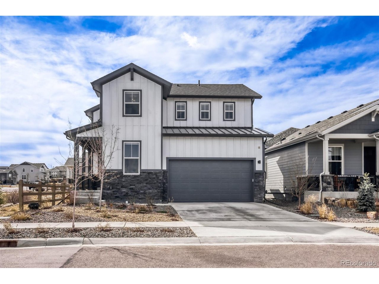 Rare opportunity to own a home intentionally designed for long-term durability, structural integrity, and comfortable living. This property features an engineered foundation system with a structural floor specifically designed for Colorado's expansive soils, offering added stability and peace of mind. The home also includes Class 4 hail-resistant shingles installed in 2024. This home has been thoughtfully maintained with additional features optimized for health and wellness, with a focus on low-toxin materials, sensitivity-friendly practices, natural rhythm support, and mold-aware preventive measures. If you're interested in the details of these intentional enhancements, reach out for a full overview document. Perfectly positioned on a premium corner lot backing to open green space in Mariana Butte, this newer home offers direct access to the Mariana Butte trail system, connecting you to Boedecker Lake, Buckingham Lake, and 17 acres of preserved natural open space while still being just 3 miles from the restaurants, breweries, and charm of downtown Loveland. Inside, the home offers over 3,300 finished square feet with a bright open layout, high ceilings, and thoughtful upgrades throughout. The kitchen anchors the main living space with granite countertops, a large island, pantry, and stainless steel appliances, flowing seamlessly into the dining and family room for easy entertaining. Adjacent to the dining room is a dedicated main floor office, ideal for working from home. The upper floor features convenient laundry facilities, and the finished basement offers tons of storage along with an additional bedroom and bathroom, perfect for guests, multigenerational living, or a private retreat.