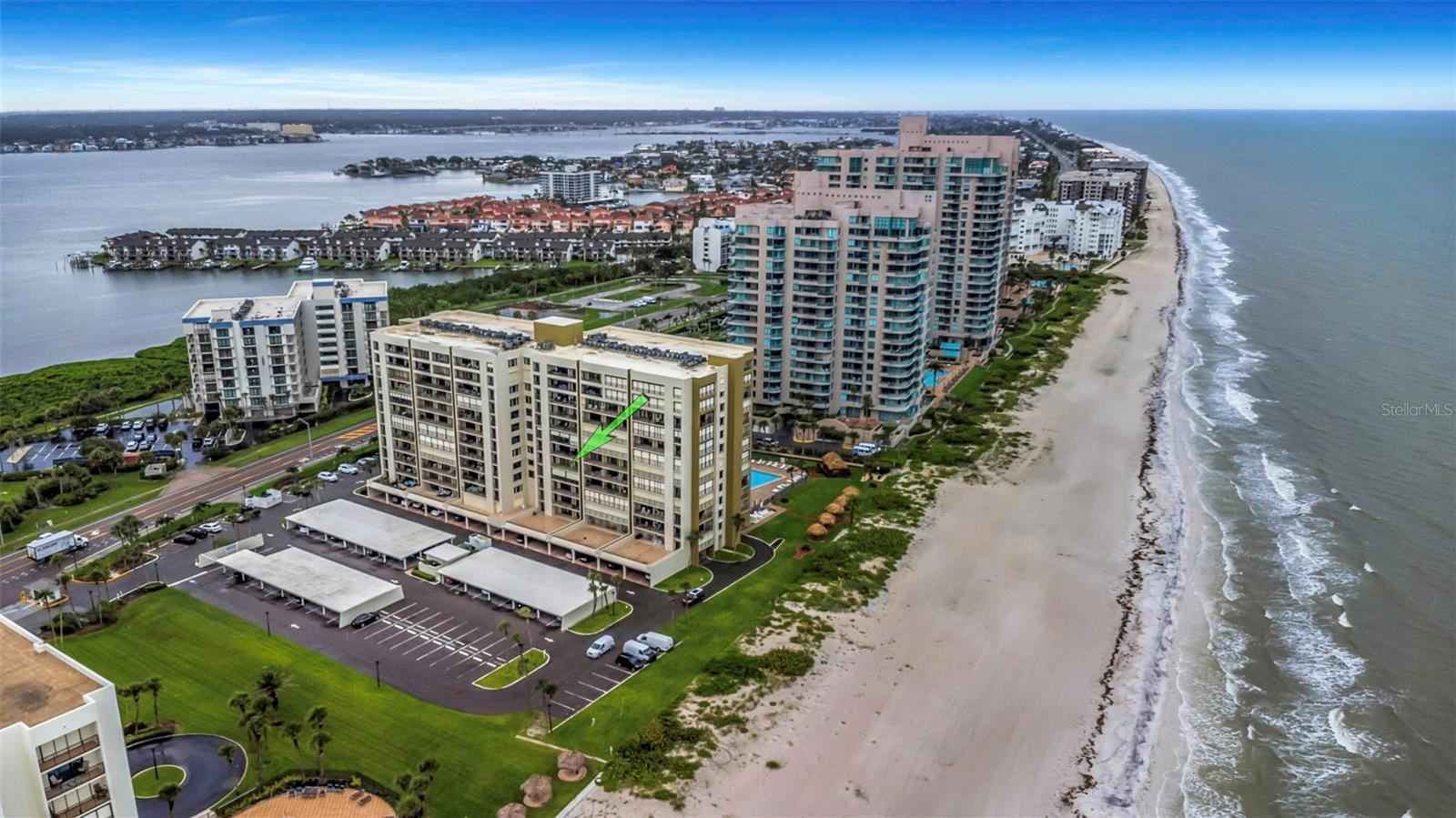 Enjoy breathtaking Gulf and Intracoastal views from this beautifully maintained 2-bedroom, 2-bath condo located directly on the beach. The spacious living area features two sets of sliding glass doors that open to a private balcony, offering stunning water views and natural light throughout.

The kitchen is well-equipped with ample counter space and cabinetry, ideal for cooking and entertaining. The primary bedroom easily accommodates a king-size bed and includes sliding glass doors to the balcony, along with an en suite bathroom for added privacy and convenience.

Additional features include assigned under-building parking, a private storage unit, and a pet-friendly policy. Milestone and SIRS reports are completed, and monthly fees include flood insurance, hurricane shutters, water, sewer, trash, cable, and internet—adding convenience and peace of mind.

Resort-style amenities include a Gulf-front pool, tiki huts, gas grills, and a shaded pavilion. Perfectly located just minutes from Sand Key Park with nature trails and a dog park, Bay Park offering tennis and pickleball courts, and the Shops on Sand Key for dining and retail. Clearwater Beach’s vibrant restaurants, shops, and marine activities are also just a short drive away.

This condo offers the ideal blend of comfort, location, and coastal lifestyle—perfect as a full-time residence or vacation getaway.