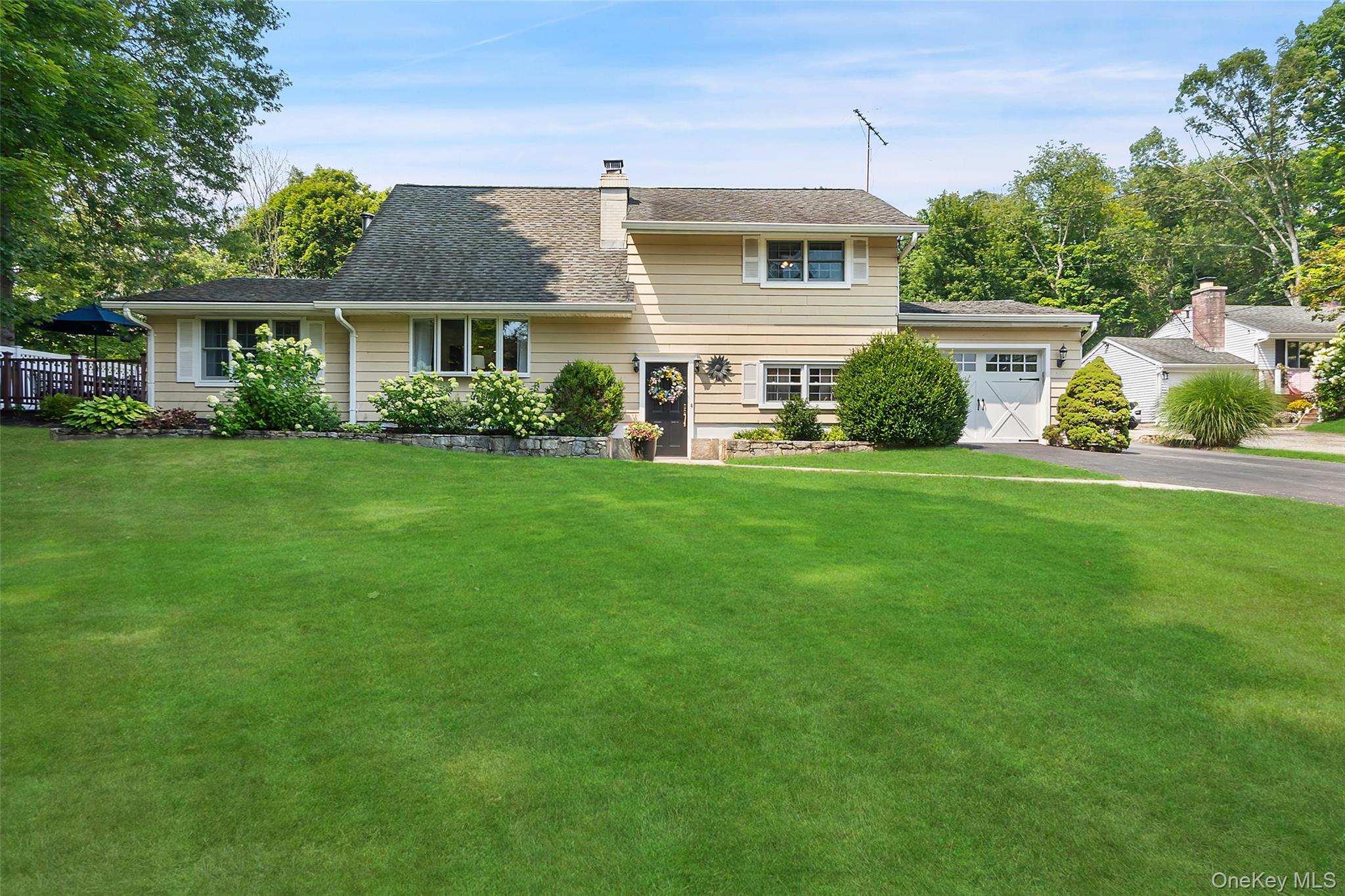 Charming North Salem gem - ready for its next chapter! This beautifully maintained, expanded, and renovated home greets you with character at every turn. Crisp custom moldings make every room feel unique & special, while hardwood floors create warmth and flow. The kitchen isn’t just renovated - it’s been expanded into a space overlooking the garden where casual Sunday pancakes and festive holiday gatherings feel equally at home. A show-stopping back yard with fenced in-ground pool shimmers under the sun, surrounded by blooms and greenery, ready for poolside laughter and evening swims under the stars. Every corner speaks of meticulous upkeep and thoughtful updates: central A/C & forced-air heating, well-appointed island kitchen with stainless steel appliances, large pantry, wood-burning stove & fireplace, dual-paned windows with window treatments, 2-car tandem garage, pool shed, finished lower level, and plenty of storage. Easy access to town favorites - The Blazer Pub, Purdy’s Farmer & the Fish, Harvest Moon Farm, NS Farmers Market, downtown Croton Falls, 684, and multiple Metro-North stops to NYC. Create new memories in a home filled with love!