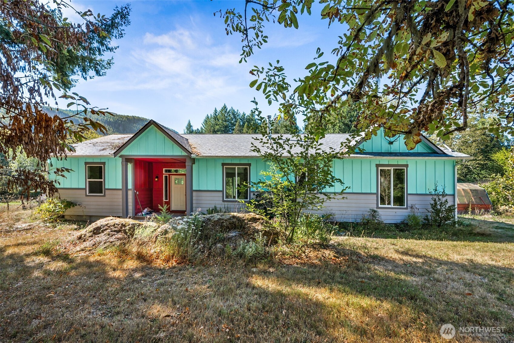 Built in 2015, this 3-bedroom, 2-bath home offers modern comfort on 24 acres with coveted Cowlitz River frontage. A cozy wood stove anchors the living space, while outside you’ll find mature fruit trees, multiple outbuildings, and open pasture ideal for animals, gardens, or homesteading. Conveniently close to Randle’s school, health and dental clinics, and library, yet surrounded by adventure. Ideally located and within reach of White Pass Ski Area, Mt. Rainier, and Mt. Adams. With space to roam, year-round recreation, and a blend of convenience and seclusion, this property is perfect for farming, self-sufficiency, or simply enjoying the best of Pacific Northwest living.