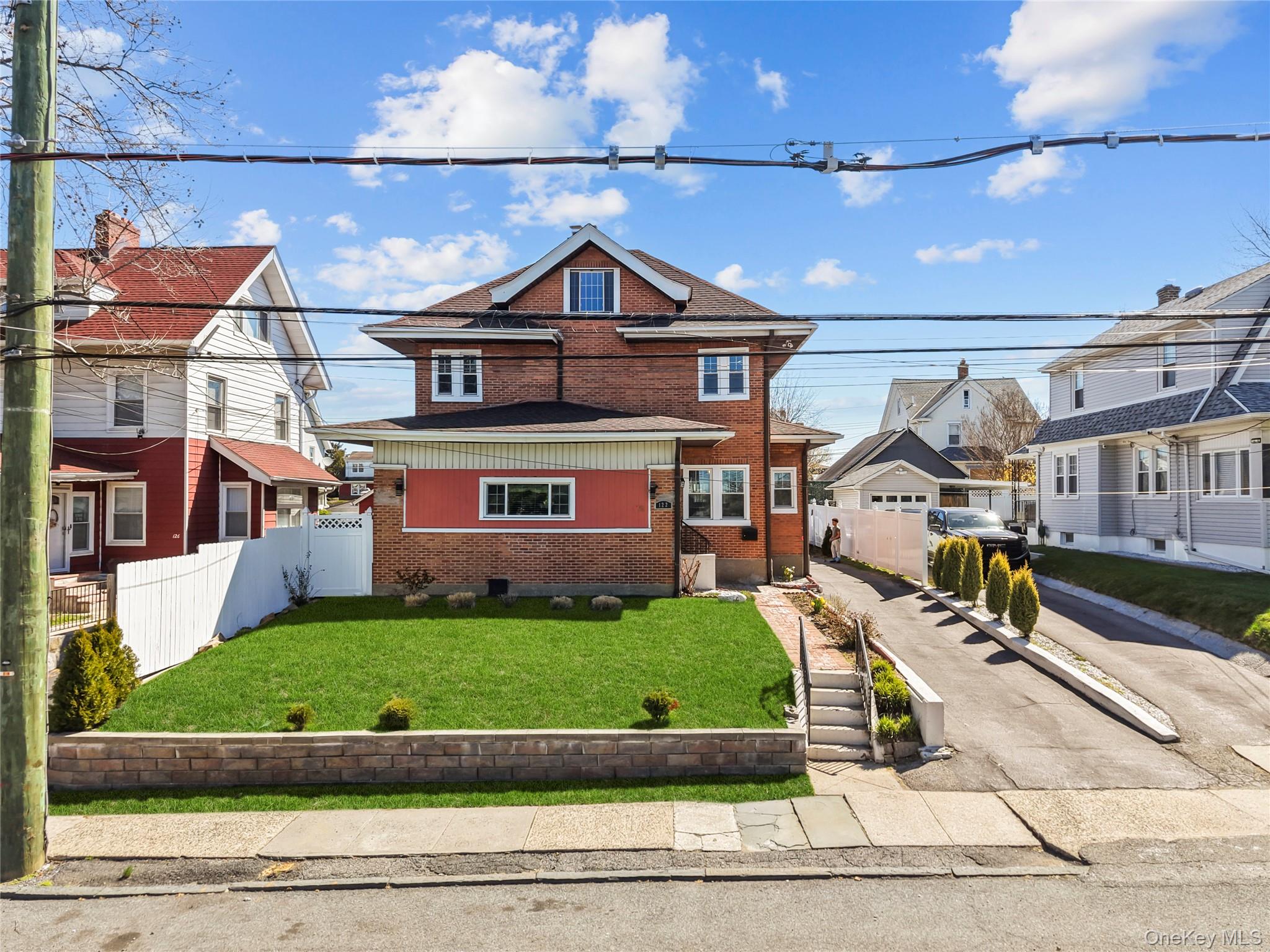 Welcome to this beautifully maintained 3-bedroom, 2.5-bath home in the desirable Bryn Mawr section of Yonkers. This home blends classic charm with modern updates and offers a warm, inviting layout.  Conveniently located near parks, schools, shopping, and dining. Commuters benefit from access to the Bee-Line Bus System and nearby Metro-North Hudson Line stations including Yonkers, Glenwood, and Greystone, offering an easy commute to New York City.A welcoming foyer opens to a spacious living room that flows into a large formal dining room with wood beam ceilings. The eat-in kitchen includes a pantry and ample space for everyday living.A finished basement provides additional living space, perfect for a home office, recreation, or storage. Recent upgrades include a new roof and new windows. Solar panels are installed offering energy efficiency and long-term savings.Exterior features include a large driveway accommodating up to 7 vehicles.Don’t miss this opportunity in one of Yonkers’ most sought-after neighborhoods!