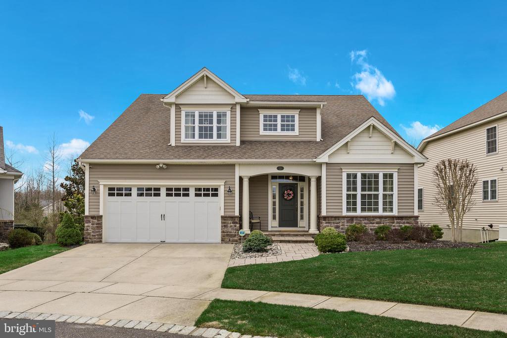 Nestled on a serene cul-de-sac, 10 Brinklow Court is a stunning example of modern living paired with timeless charm. This impeccably maintained home boasts 3-4 spacious bedrooms and 3 beautifully appointed bathrooms, all thoughtfully arranged across 3,342 square feet of well-designed living space. From the moment you step inside, you'll feel at home in its warm, inviting ambiance.The sunlit interiors are brimming with standout features, including gleaming hardwood floors, tray ceilings, custom moldings, recessed lighting, creating an atmosphere that’s both elegant and welcoming. The heart of the home is the chef’s kitchen—a true showpiece outfitted with stainless steel appliances, granite countertops, a ceramic tile backsplash, oversized island, and gas range with hood. Whether you're prepping weeknight meals or hosting a gathering, this space is as functional as it is beautiful. Adjacent living and dining areas flow seamlessly, making entertaining a breeze.Retreat to the primary suite, a haven of relaxation that offers two walk in closets, double vanity, and oversized walk in shower stall. Each additional bedroom is well-sized, offering comfort and flexibility for family and guests.  There is also a main floor office.  As well as a sitting room overlooking the private backyard.  Don't miss the amazing full basement!  The basement is finished with a rec room, lots and lots of storage, and a super large area that can be used for storage, hobbies, and more.  And with double French doors to a rear walk out patio overlooking the backyard.The outdoor spaces are equally impressive. The backyard is a private oasis designed for both relaxation and fun, featuring a maintenance free deck, and wooded views. Picture warm summer evenings spent grilling, dining al fresco, or simply unwinding under the stars.Set in the highly sought-after location of Wyngate, 10 Brinklow Court offers the perfect balance of privacy and convenience. Enjoy easy access to major highways, parks, dining, shopping, golfing, and Medford Village, ensuring everything you need is just minutes away.This home is a rare find in today’s market, combining style, comfort, and a prime location. Don’t let this opportunity pass you by—schedule your private showing today and experience all that 10 Brinklow Court has to offer!