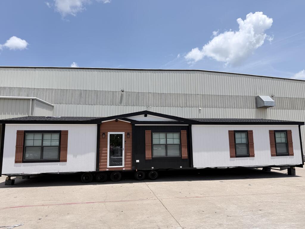 Welcome Home! Beautiful 3 Bedroom, 2 Bath manufactured home featuring Trey Ceiling w/ beam accents - living room. Drop Trey ceiling and pendant lights - kitchen. Electric Fireplace fireplace, Ceiling fans, Sahara Noir Countertops, Modern Pine Cognac flooring throughout. Many Luxury upgrades. Price includes land and improvements. Turnkey and your home! Greenwood ISD! HOA is $150/Year. Lot 105. Check out our website: NEWGENESISHOMES.NET.