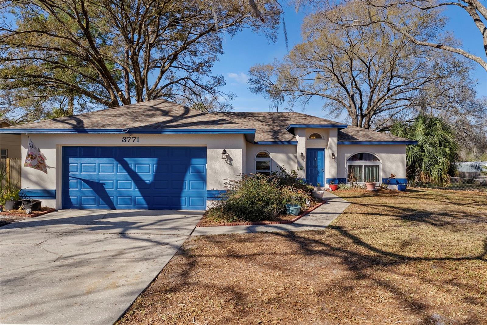 Abundant with love and pride in ownership, this single story home is ready for new owners’ stewardship…with investments already wisely made with new roof, new deck and fencing, new water heater, some newer low E impact windows, new interior and exterior paint and re-screened patio.  This 3 bedroom plus office, 2 bath home has vaulted ceilings, creating open spacious feel and with laminate, LVP and tile floors throughout clean and easy to maintain.  Located on a special 1/4 acre lot, the yard space is fantastic - especially with the current owners’ gardening and nature embracing hobbies - one will see special tree and plant species and may even see some blue birds and butterflies! The outdoor spaces are lovely - including the screened in patio as well as the new large deck.  Yard is fenced, too!  Located in amenity rich Lake Padgett Estates East, the property owners’ association includes a clubhouse, dog park, fitness center, playground, pool, racquet ball /tennis courts, and fishing lake.  A stone’s throw from main commute thoroughfares, location is great - whether close by for grocery, restaurants and shopping or heading to the beaches, downtown Tampa or the Moffitt/USF area.