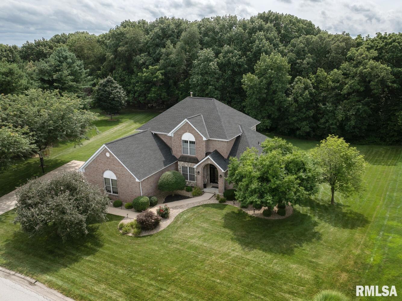 Exquisite 4 bedroom 3.5 bath home in the highly desirable Timberline subdivision! Beautifully remodeled kitchen, large master suite with 5-piece bath, 19' ceilings over the tall stone fireplace, and a walkout basement perfect for recreation or multi-generational living. The backyard is private with the woods behind and neighbors far away. Relax on the deck or next to the fire pit by the patio. Recent improvements include a new roof in October 2024, one water heater in July 2025, HVAC, paint, light fixtures, flooring, EV charger, and reverse osmosis system. Homes in Timberline don't usually last long so don't wait on this one!